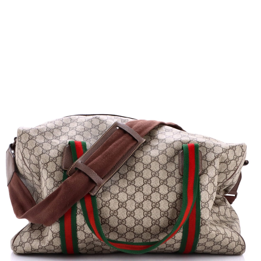 Gucci GG Convertible Duffle Bag Canvas Medium: Gucci GG Convertible Duffle Bag Canvas Medium Canvas medium Gucci GG Convertible Duffle Bag with brown exterior and interior, silver hardware, and minor wear and scuffs. This stylish and versatile bag