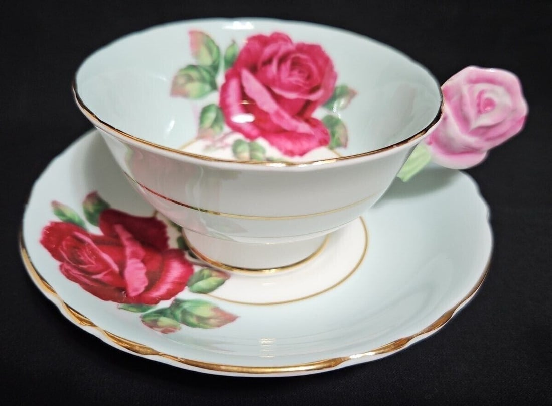 Paragon Rose Handle Light Blue Cup Saucer with Red Rose Signed Rare: Paragon Rose Handle Light Blue Cup Saucer with Red Rose Signed Rare Item Specifics: Origin: NA Number Of Items In Set: NA Shape: NA Signed By: NA Occasion: NA Keeps Cold For: NA Vintage: NA Keeps Hot 