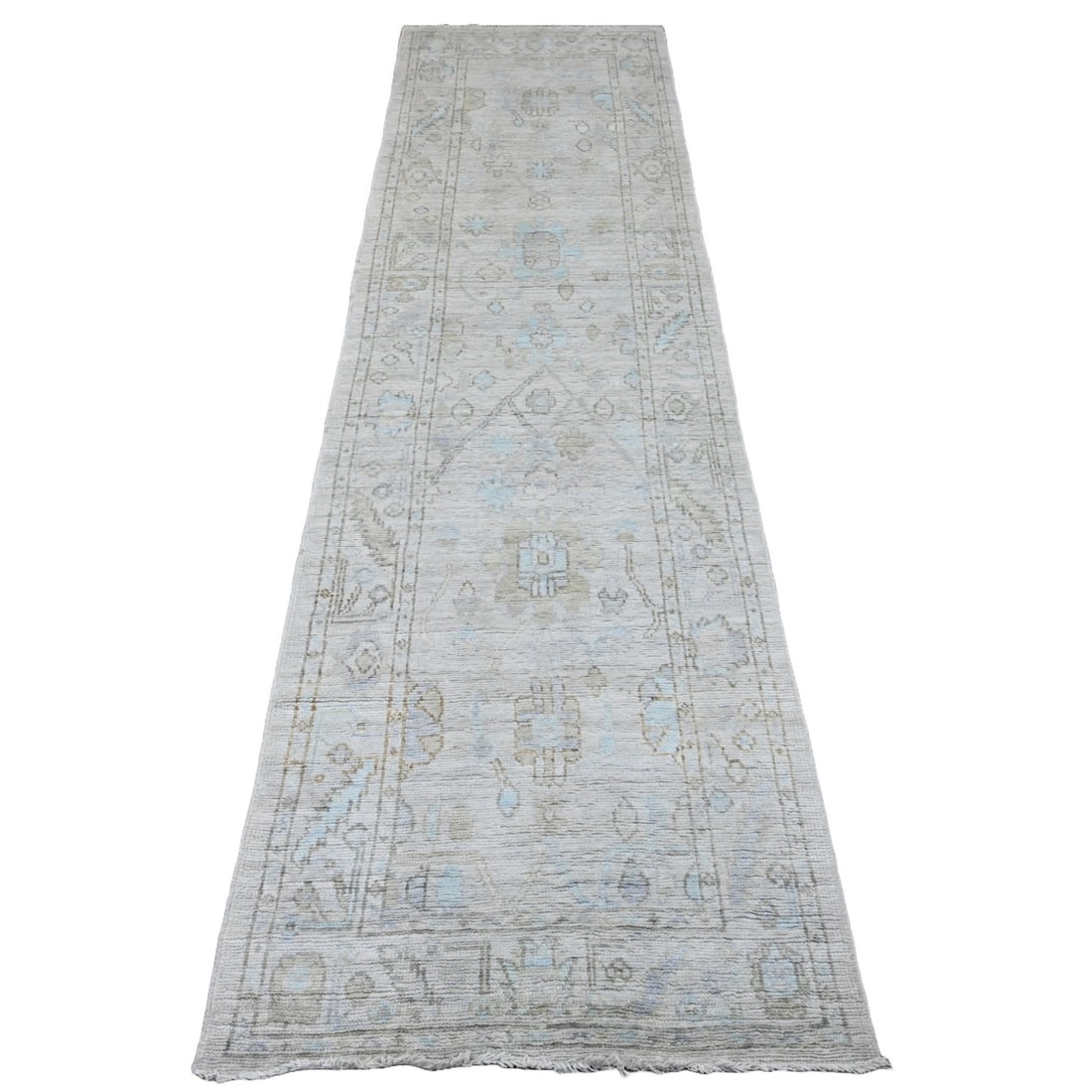 2'6"x9'7" Pastel Gray Afghan Angora Oushak Hand Knotted Wool Runner Rug: 2'6"x9'7" Pastel Gray Afghan Angora Oushak Hand Knotted Wool Runner Rug Oushak Type Afghan Hand Knotted Wool Runner Rug in Soft Pastel Gray. This 2'6"x9'7" wool runner features a subtle Oriental regio