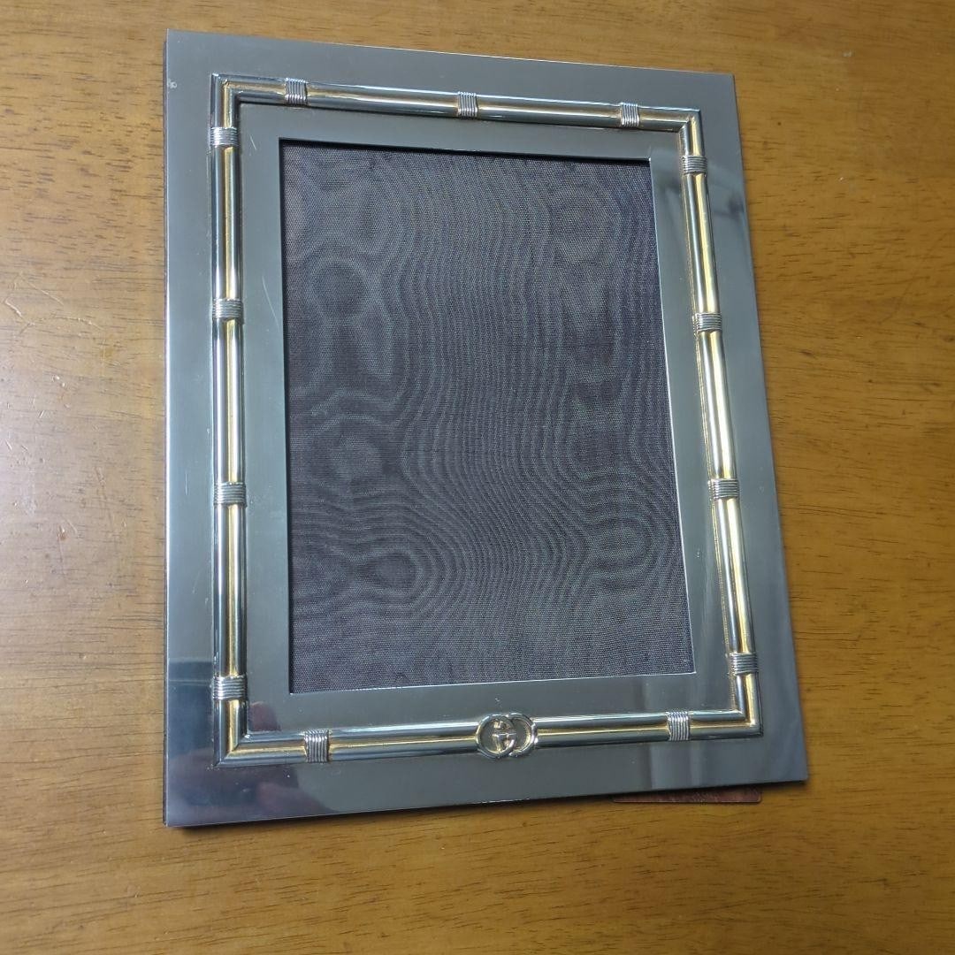 GUCCI Milano 1970 Vintage Desk Picture Frame Chrome Gilt Bronze Italy: GUCCI Milano 1970 Vintage Desk Picture Frame Chrome Gilt Bronze Italy Item Specifics: Brand: GUCCI Type: Picture Frame Item Height: 0.5 Inches Item Length: 10 Inches Item Width: 8 Inches Product Discl