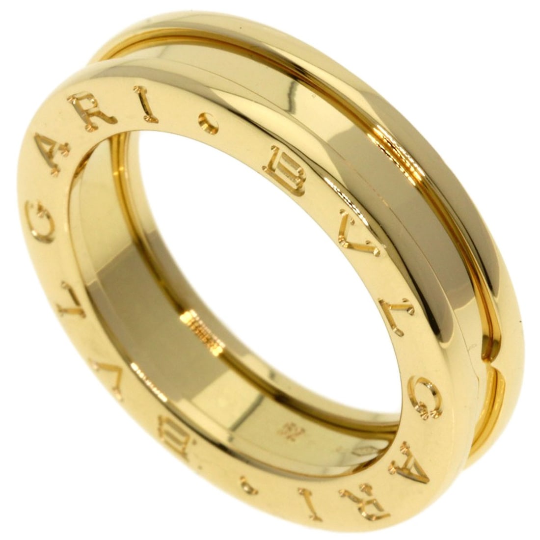 B zero1 1 band Ring K18 Yellow Gold: B zero1 1 band Ring K18 Yellow Gold BVLGARI's B zero1 1 band Ring is a sleek and sophisticated piece, set in K18 Yellow Gold. This ring features a unique band design and bears a signature, adding a to