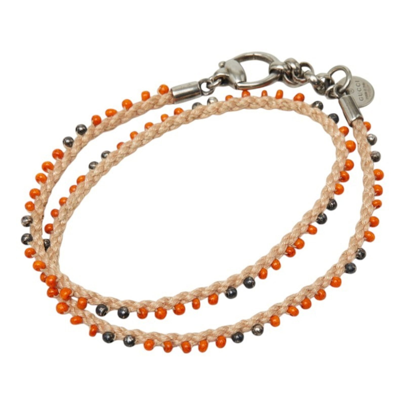 GUCCI Charm Bracelet Silver 925: GUCCI Charm Bracelet Silver 925 Gucci Charm Bracelet Silver 925 is a gently used, multi-color charm bracelet made from high-quality silver 925. The beige and multi-color design adds a touch of eleganc
