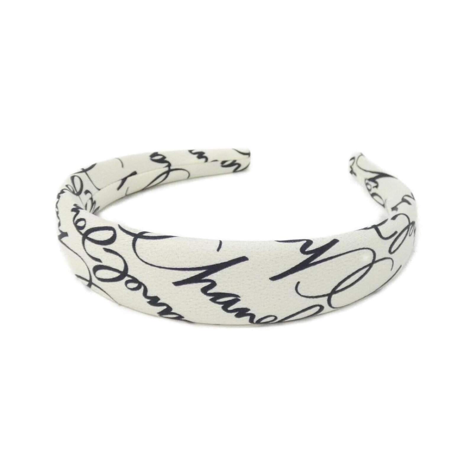 CHANEL Alice Band Silk: CHANEL Alice Band Silk Silk Alice band from Chanel, featuring a sleek black or white design. Gently used with minor signs of wear, this item is in very good condition, bearing small scratches or light