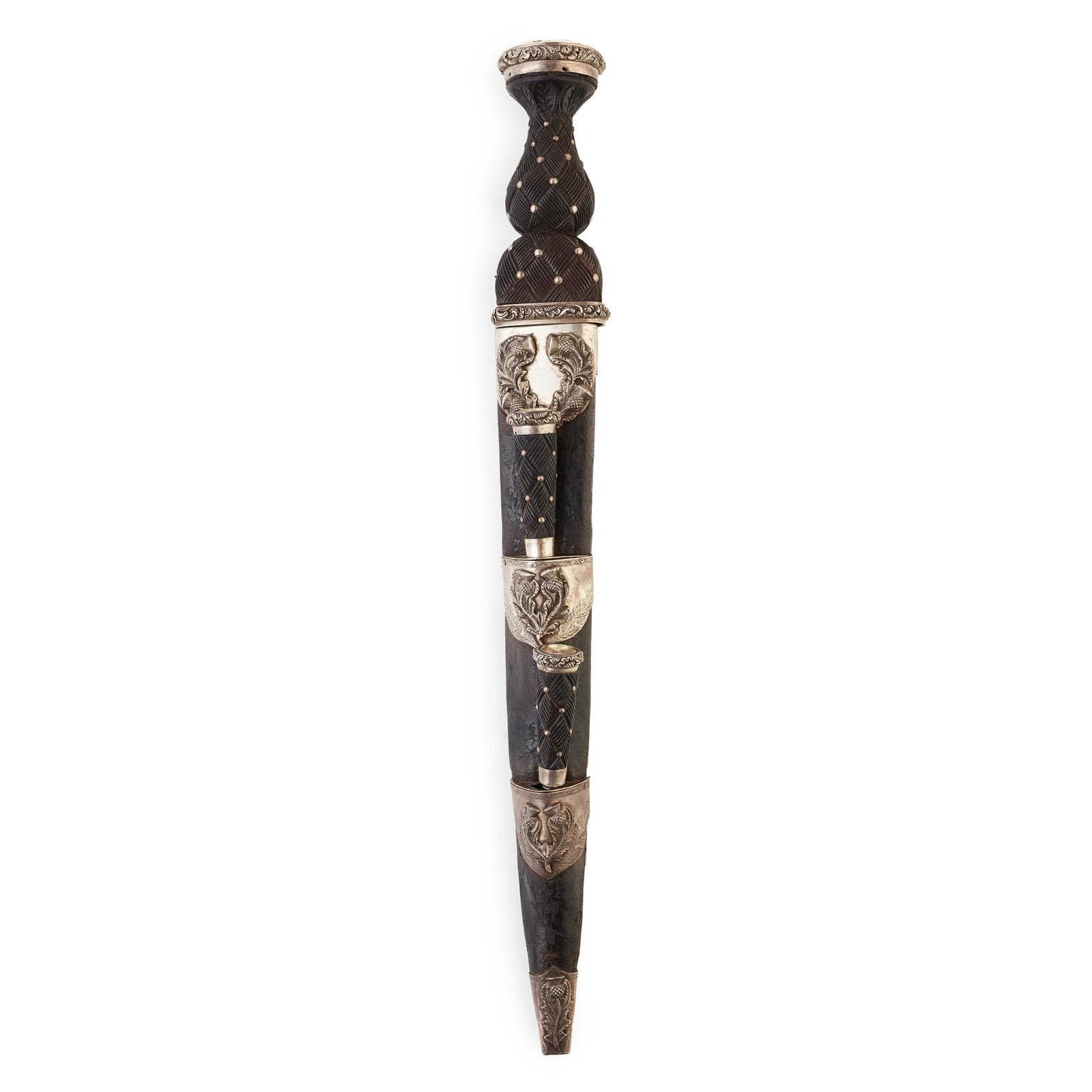 A VICTORIAN DIRK 19TH CENTURY unmarked, the basket: A VICTORIAN DIRK 19TH CENTURY unmarked, the basket weave handle set with foil backed crystal to pommel, the leather scabbard with thistle embossed mounts and set with bi knife and fork (Blade29.5cm lo