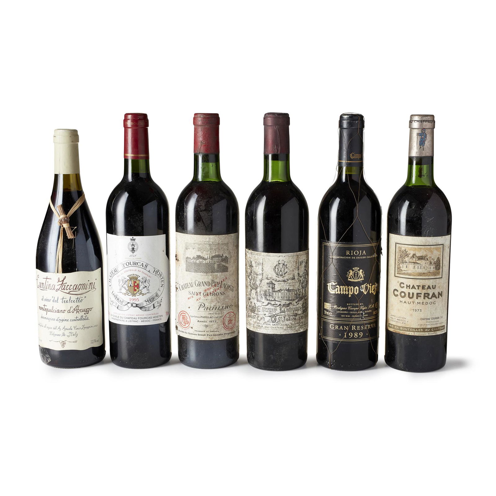 A MIXED GROUP OF RED WINE comprising a bottle of 1975: A MIXED GROUP OF RED WINE comprising a bottle of 1973 Chateau Coufran Haut Medoc; a 1972 Chateau Grand Puy Lacoste Pauillic; a Cantina Zaccagnini Montepulcino dÂ’Abruzzo; a 1995 Chateau Fourcas Hos