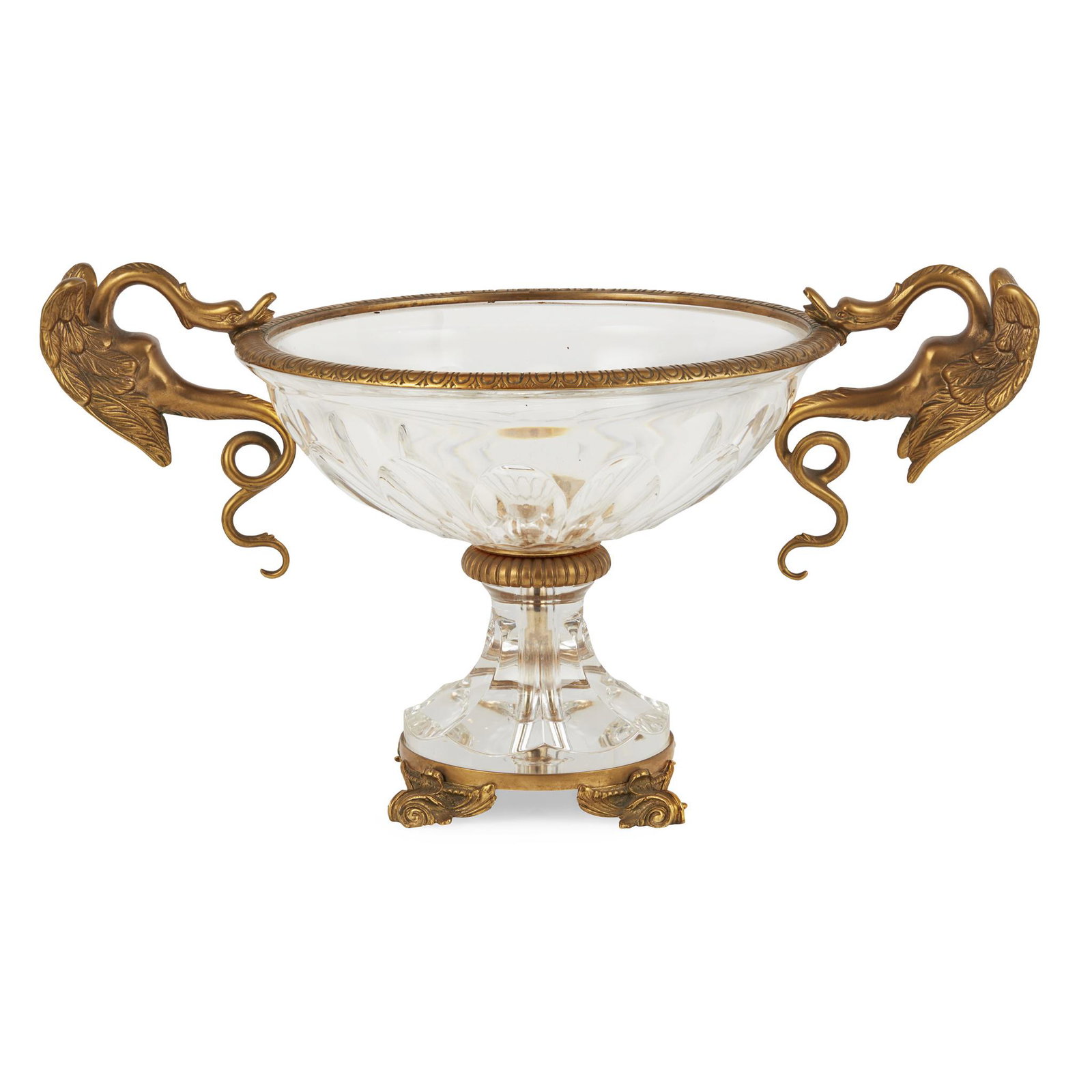 RENAISSANCE REVIVAL GLASS AND GILT METAL MOUNTED: the heavy lobed glass dish mounted with winged serpent handles, on a faceted socle base and gilt metal scroll feet (Dimensions: 51cm wide, 25.5cm high) (51cm wide, 25.5cm high)