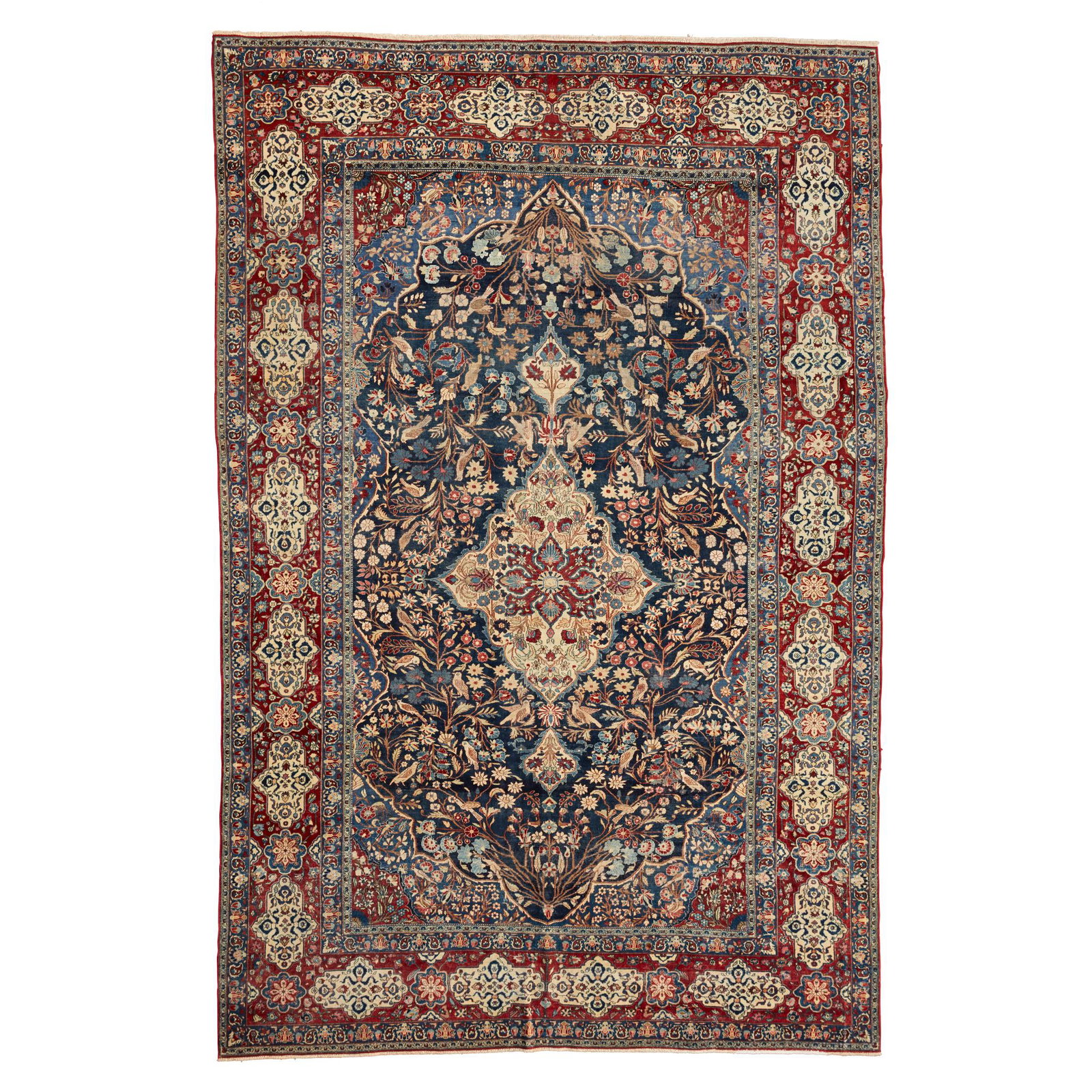 ISFAHAN PART SILK CARPET CENTRAL PERSIA, LATE: the indigo field with cream medallion, blue and red spandrels, within red cartouche border (Dimensions: 313 x 210cm) (313 x 210cm)