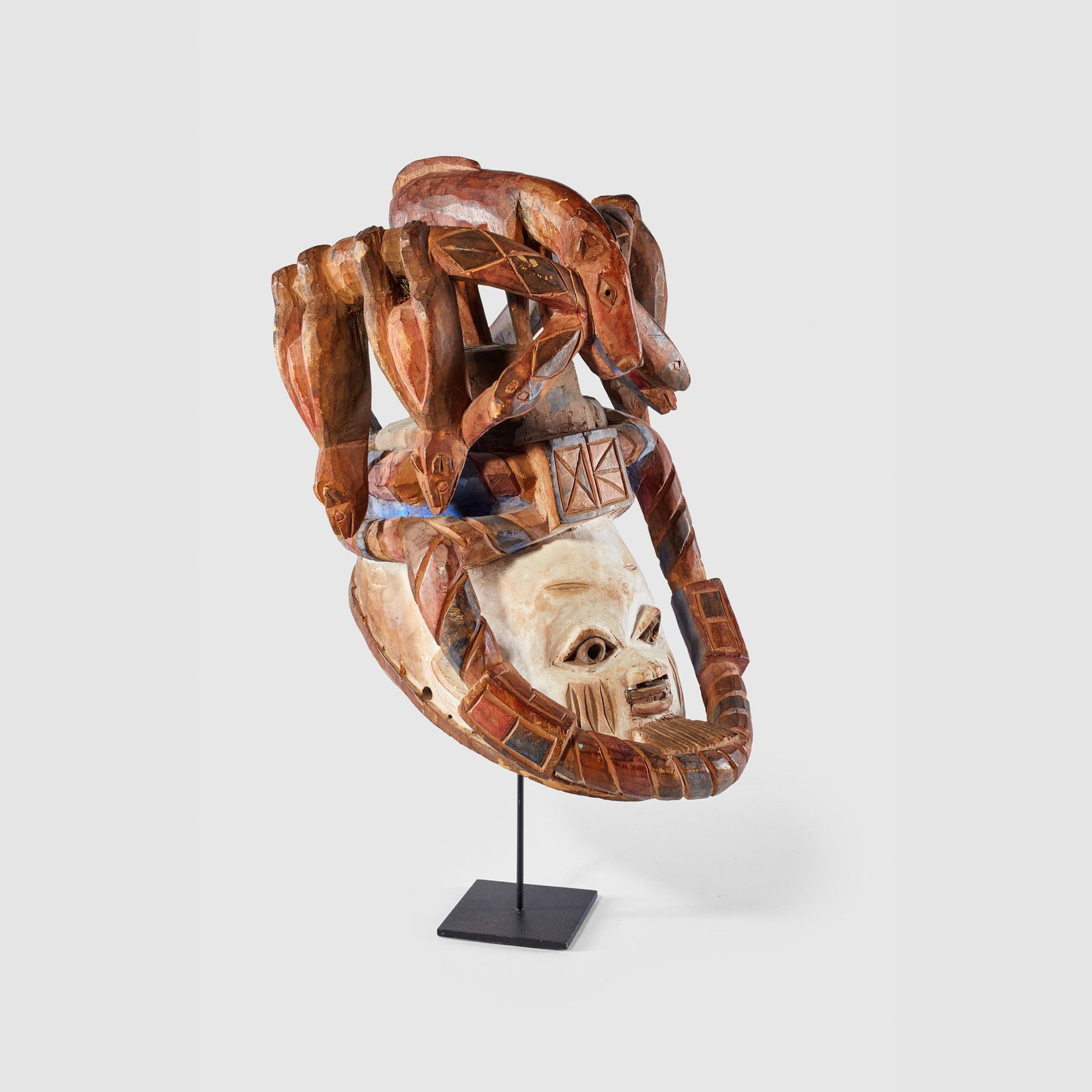 YORUBA MASK, GELEDE NIGERIA: carved wood and pigment, with an elaborate headdress (Dimensions: 41cm tall) (41cm tall) Footnote: Provenance: Private collection, United Kingdom