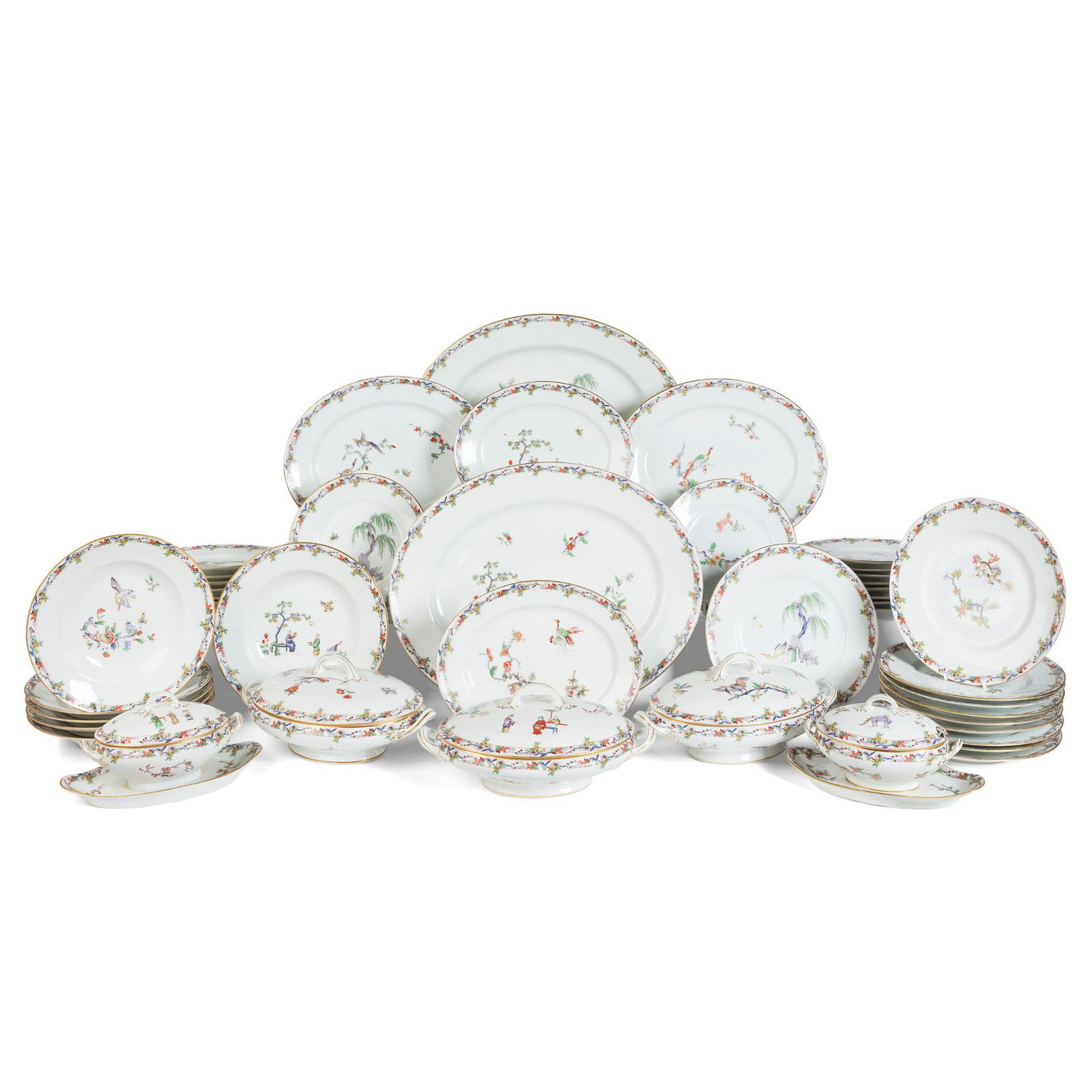 BERNARDAUD LIMOGES 'CHANTILLY' PATTERN PART DINNER: retailed by Waring and Gillow, London, comprising: 11 dinner plates, 6 soup plates, 17 lunch plates, 3 covered vegetable dishes, 2 covered sauce boats, a pair of meat platters, 4 smaller platters (Dim