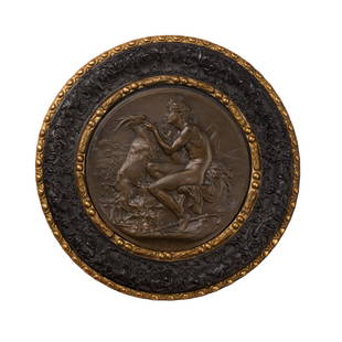 AFTER HENRI AUGUSTE PATEY, BRONZE RELIEF ROUNDEL OF: signed 'A. Patey, Rome 1883', within an ebonized and gilt frame; together with a BRONZE ROUNDEL, depicting Minerva and attendants (Dimensions: Bacchus 34cm diameter, Minerva 17cm) (Qty: 2)(Bacchus 34c