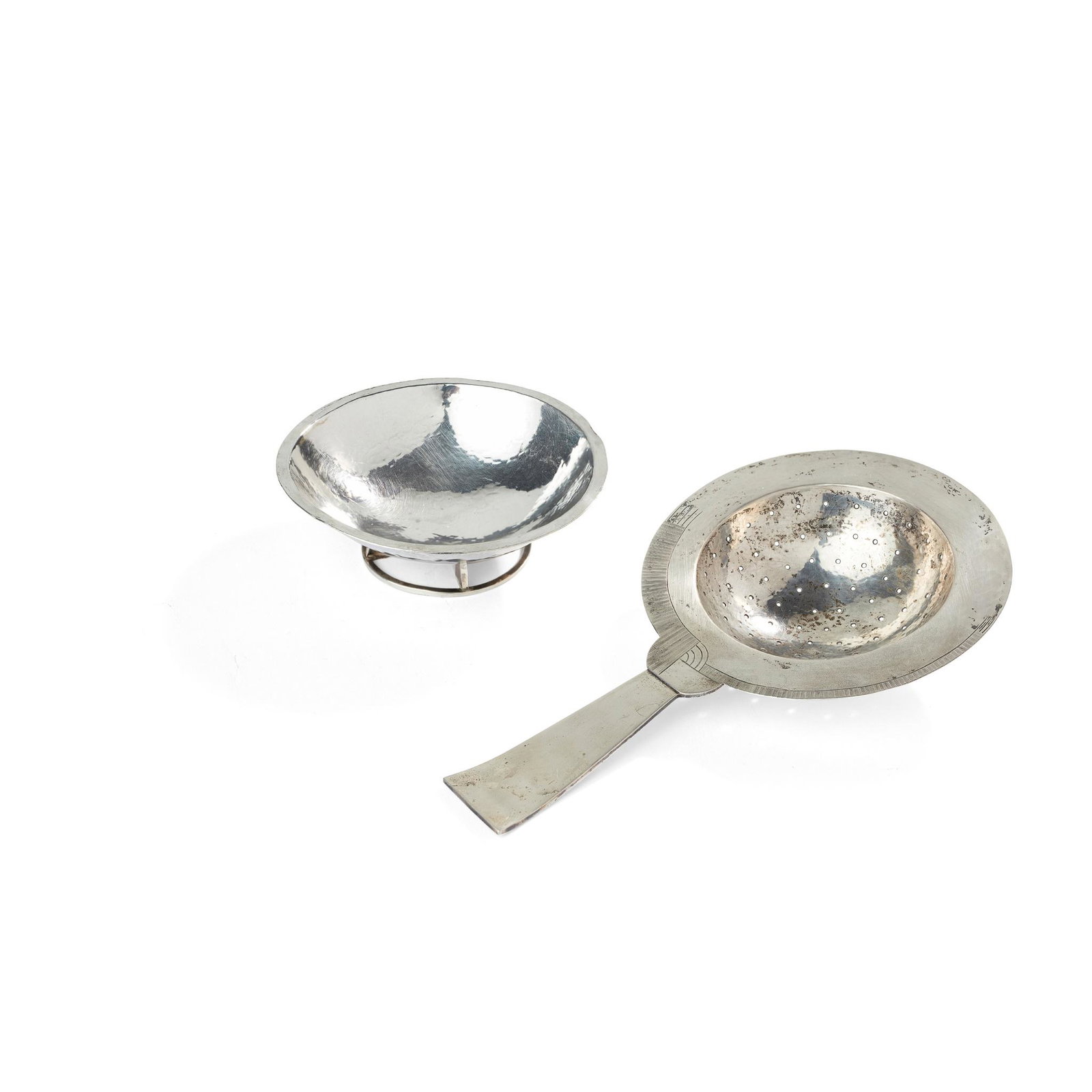Â§ Bernard HÃ¶tger (German 1874-1949) Tea Strainer and: Â§ Bernard HÃ¶tger (German 1874-1949) Tea Strainer and Stand, designed circa 1930 manufactured by Franz Bolze, Bremen, circa 1930, both pieces stamped standard marks and manufacturer's marks, the 