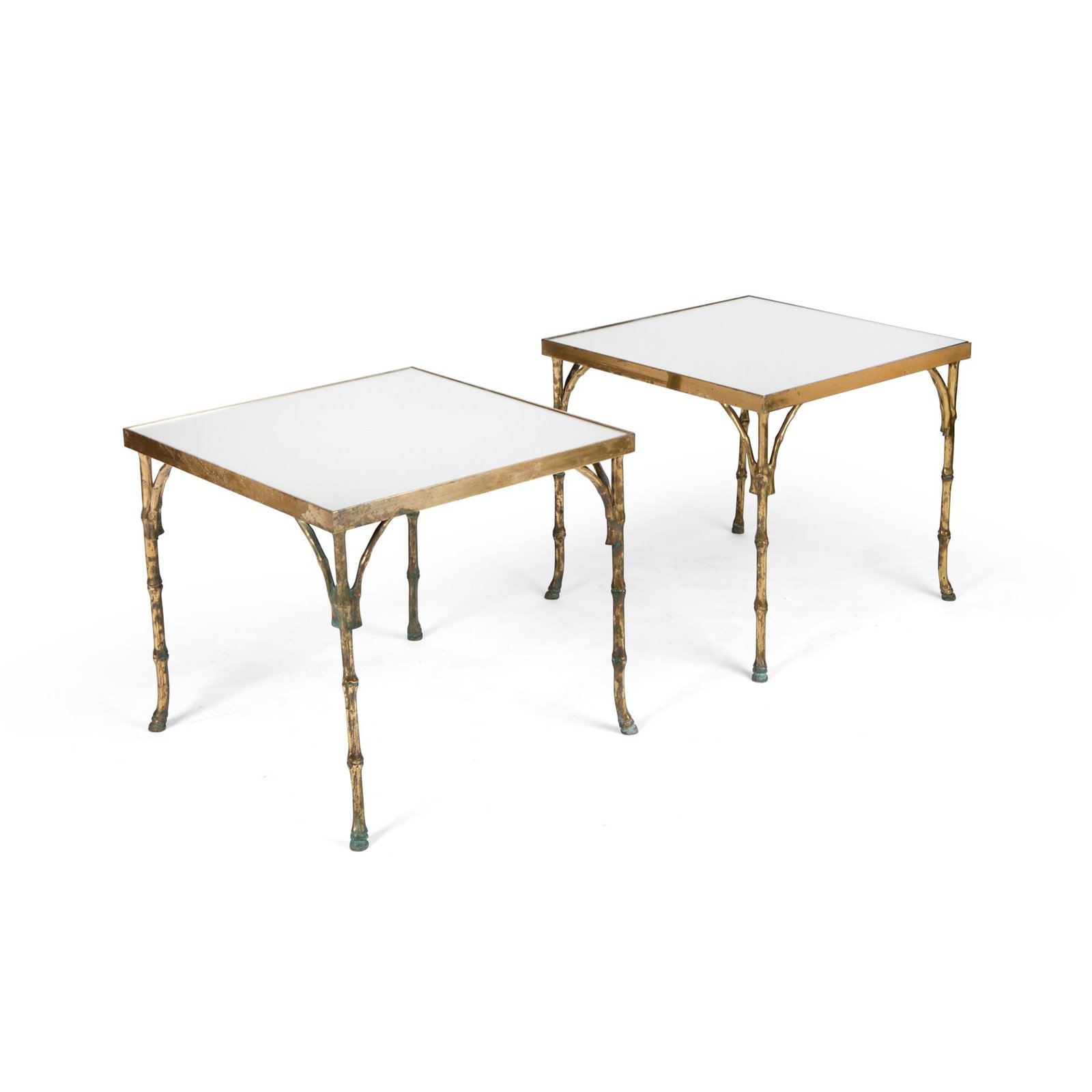 Maison BaguÃ¨s Pair of Side Tables, c.1940-60: Maison BaguÃ¨s Pair of Side Tables, c.1940-60 mirrored glass tops, framed and supported in gilt metal, possibly bronze, cast to simulate bamboo, and horse hoof feet (41cm high, 45.5cm across, 45.5cm