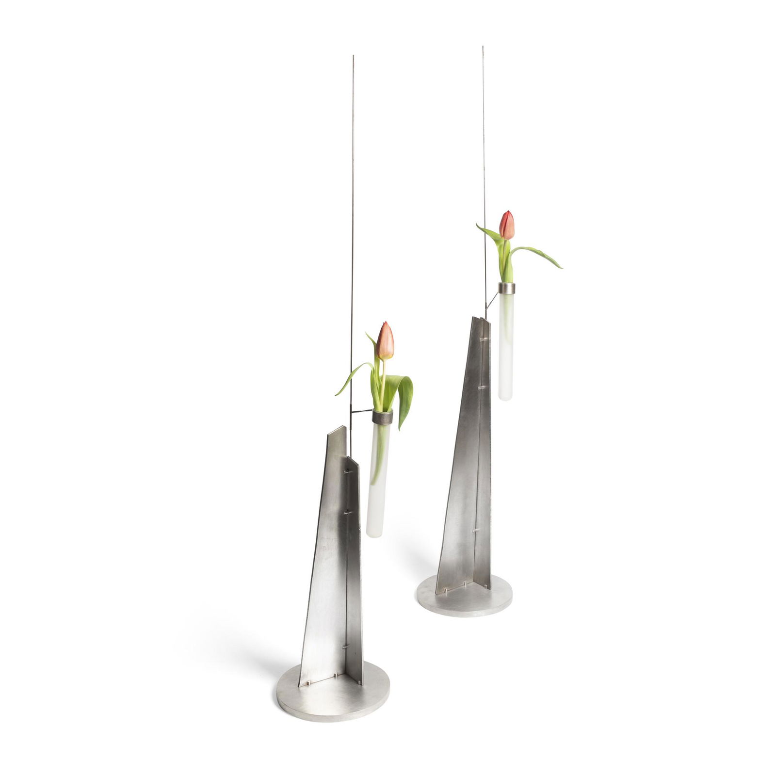 Â§ David Clarke (British 1967-) Two 'Orgy' Orchid Vases: Â§ David Clarke (British 1967-) Two 'Orgy' Orchid Vases hallmarked, glass â€˜test-tubeâ€™ shaped vase, attached to a triangular base of two sheets of silver, connected by thin steel rods. (