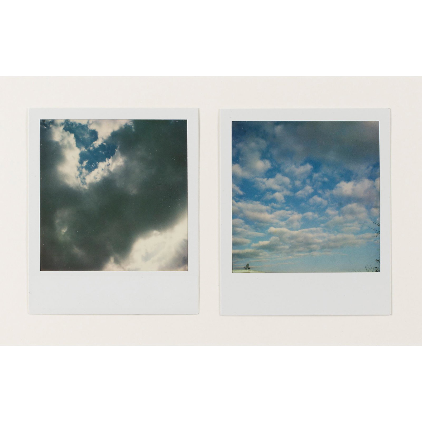 Nobuyoshi Araki (Japanese b.1940-) Untitled (Sky): Nobuyoshi Araki (Japanese b.1940-) Untitled (Sky) each signed (to reverse), two polaroids (each polaroid 10.8cm x 9cm (4.25in x 3.5in))