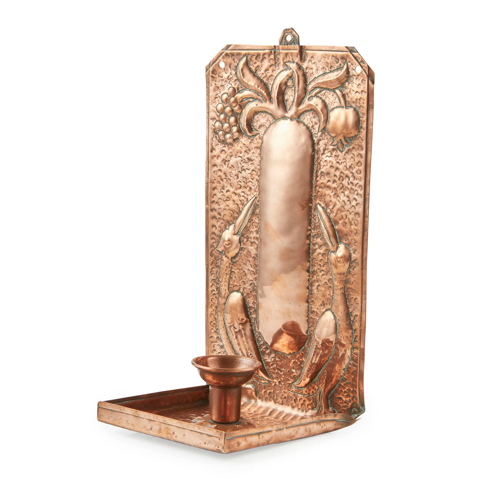 MANNER OF JOHN PEARSON FOR LIBERTY & CO., LONDON ARTS &: MANNER OF JOHN PEARSON FOR LIBERTY & CO., LONDON ARTS & CRAFTS 'MEDIAEVAL' COPPER CANDLE SCONCE, CIRCA 1900 repoussÃ©-decorated with opposed birds on a beaten ground above a single sconce (29cm high
