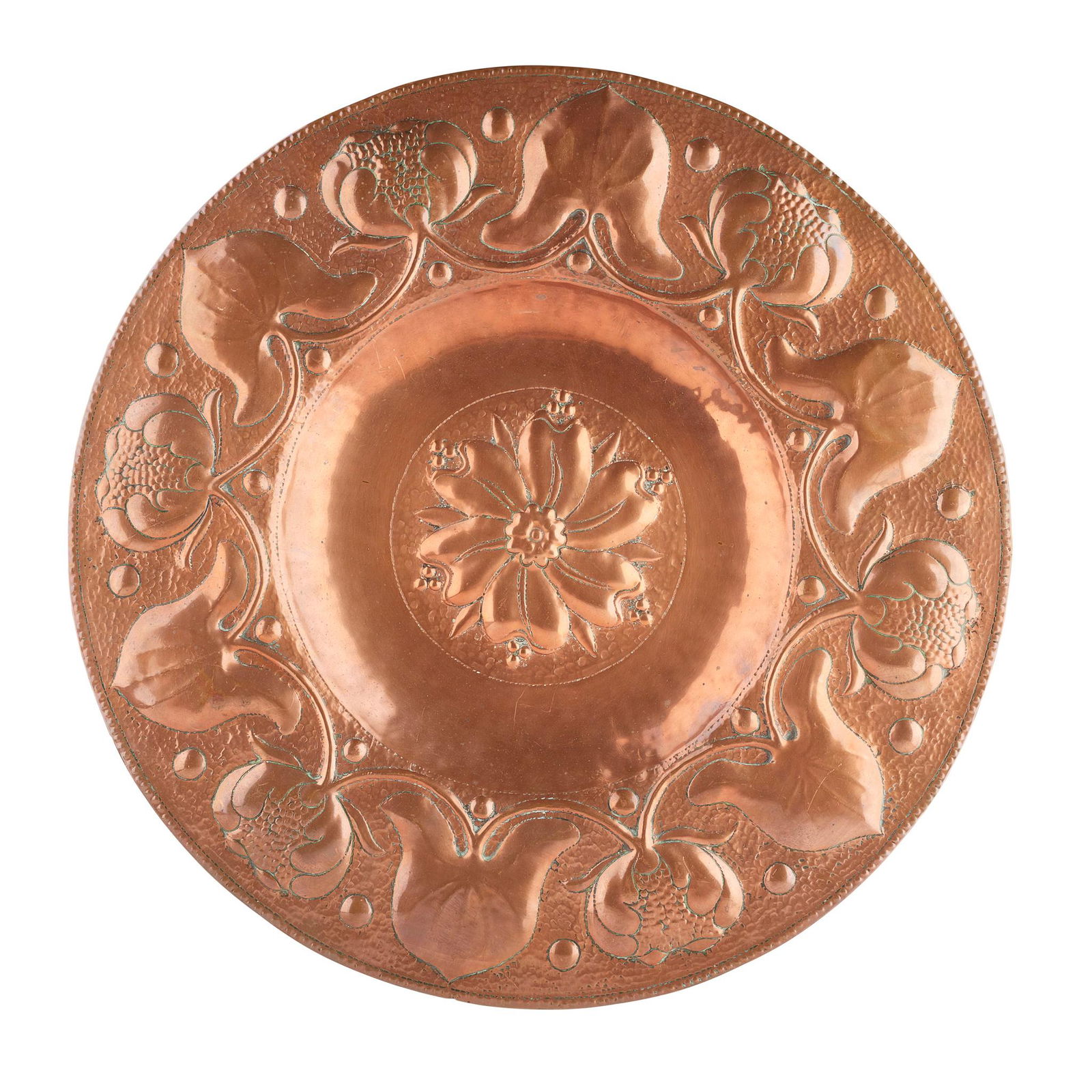 MANNER OF JOHN PEARSON ARTS & CRAFTS COPPER CHARGER,: MANNER OF JOHN PEARSON ARTS & CRAFTS COPPER CHARGER, CIRCA 1900 repoussÃ©-decorated with a central rosette within a border of flowering foliage