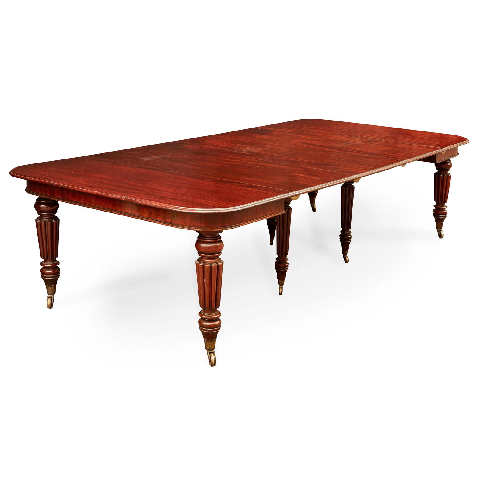 WILLIAM IV MAHOGANY EXTENDING DINING TABLE, BY T.: WILLIAM IV MAHOGANY EXTENDING DINING TABLE, BY T. WILLSON, LONDON EARLY 19TH CENTURY the rounded rectangular top opening with a telescopic action, stamped T. WILLSON 68 GREAT QUEEN ST. LONDON, on turn