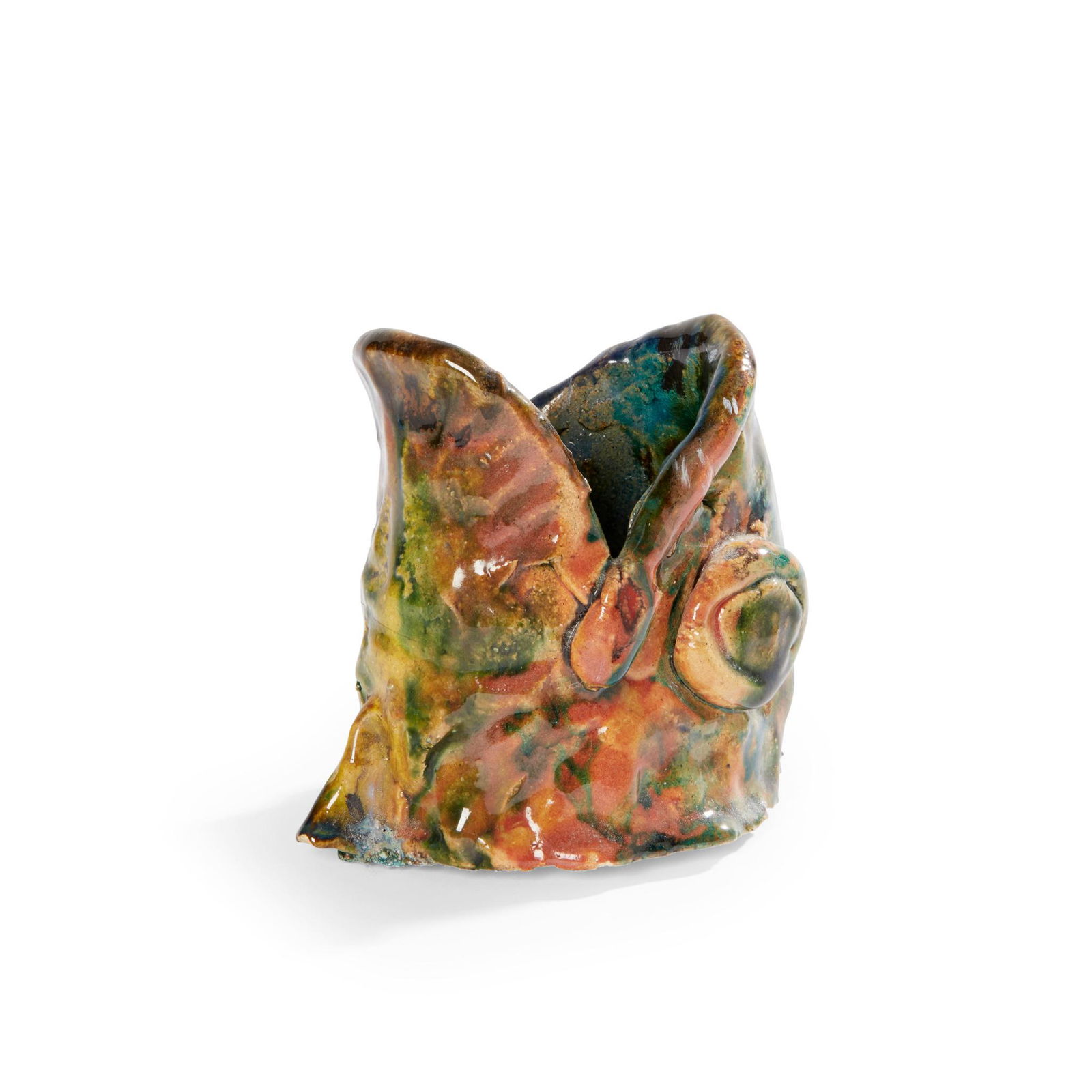Â§ KATE MALONE M.B.E. (BRITISH 1959-) FISH HEAD: mottled green glaze (Dimensions: 10cm high (4in high))(10cm high (4in high))
