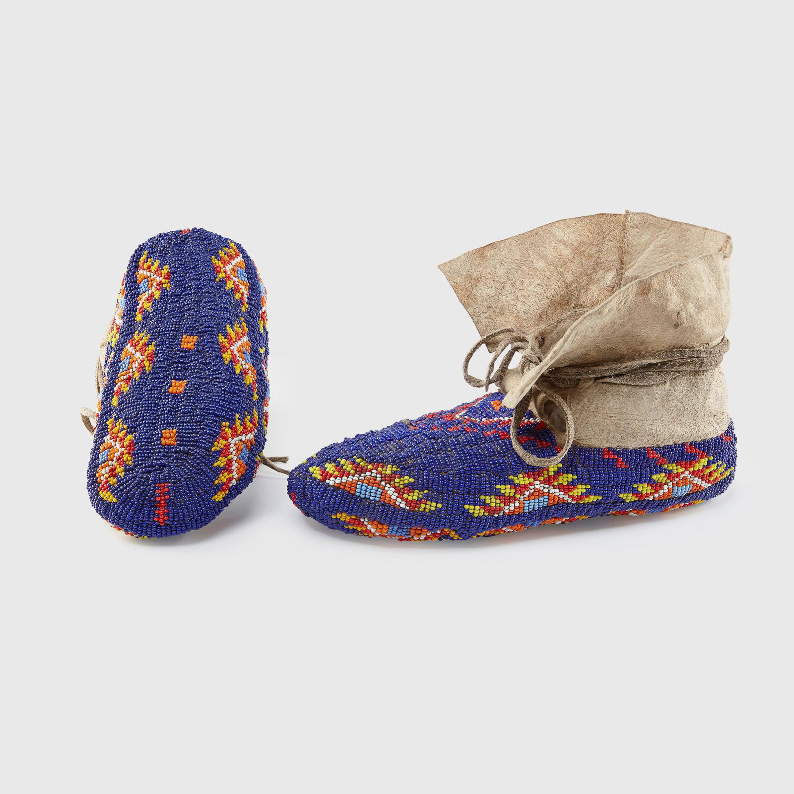 PAIR OF SIOUX MOCCASINS PINE RIDGE, SOUTH DAKOTA, (1 of 2)