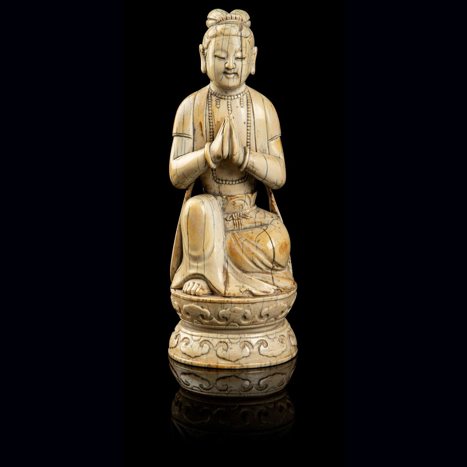 Y IVORY FIGURE OF AN ACOLYTE QING DYNASTY, 17TH-18TH (1 of 2)