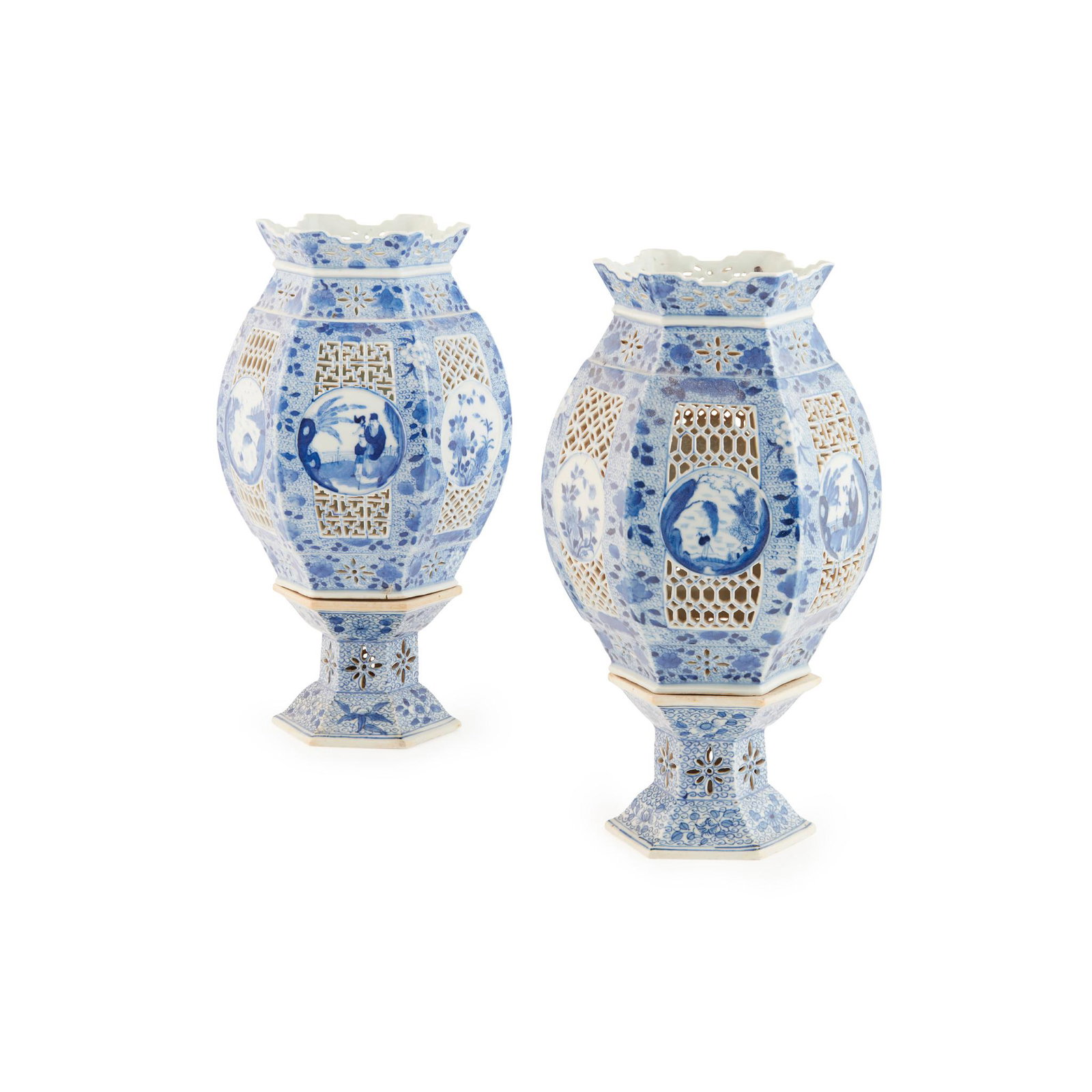 PAIR OF BLUE AND WHITE RETICULATED LANTERNS: each composed in two parts, of hexagonal form with floral, figural and landscape roundels against the pierced ground (31.2cm high each) Footnote: Provenance: from a Scottish estate
