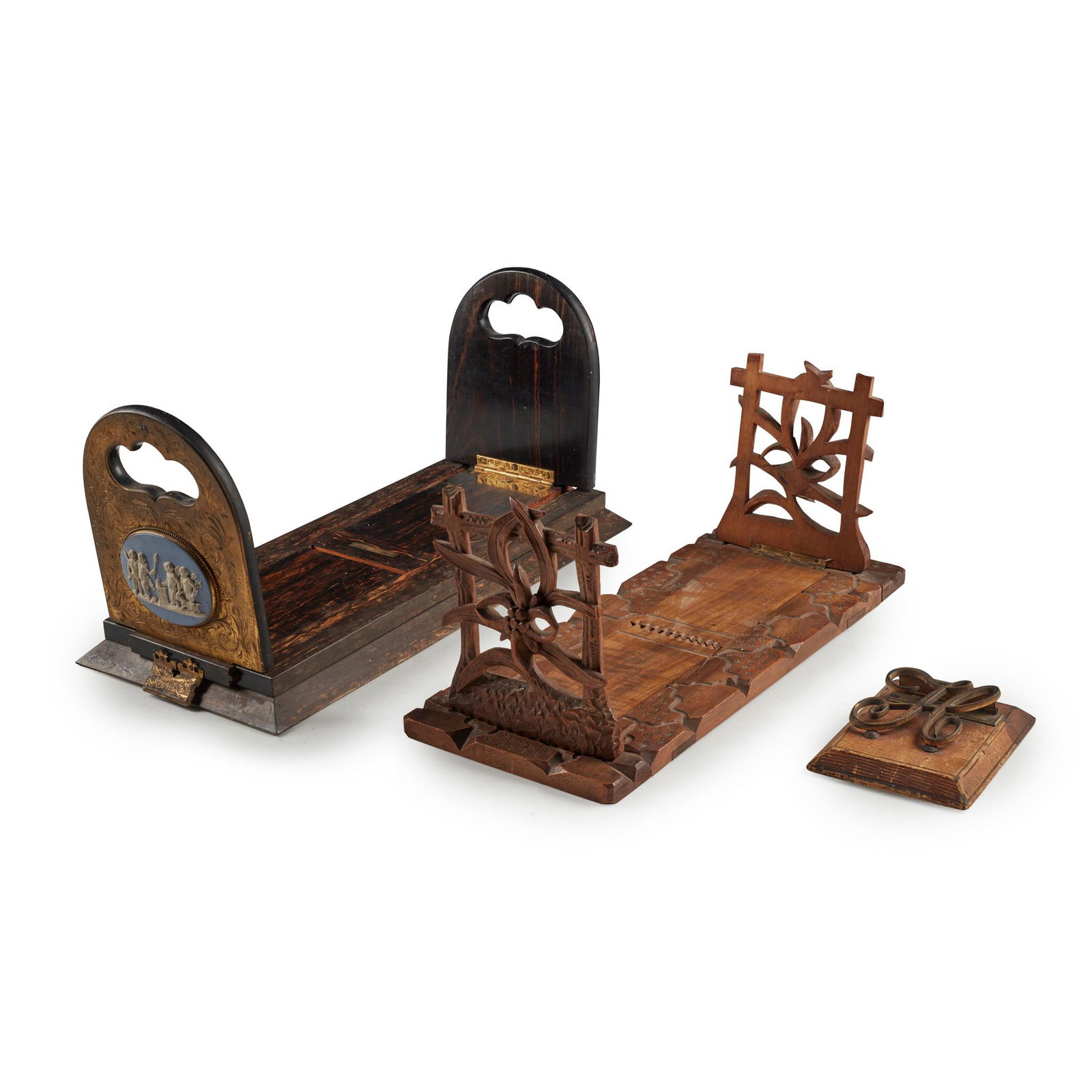 TWO VICTORIAN BOOK SLIDES MID 19TH CENTURY: TWO VICTORIAN BOOK SLIDES MID 19TH CENTURY One coromandel and brass with jasperware panels, inscribed 'Macgill, 103 Princes Street, Edinburgh'; the other a Black Forest carved beech example; and a gil