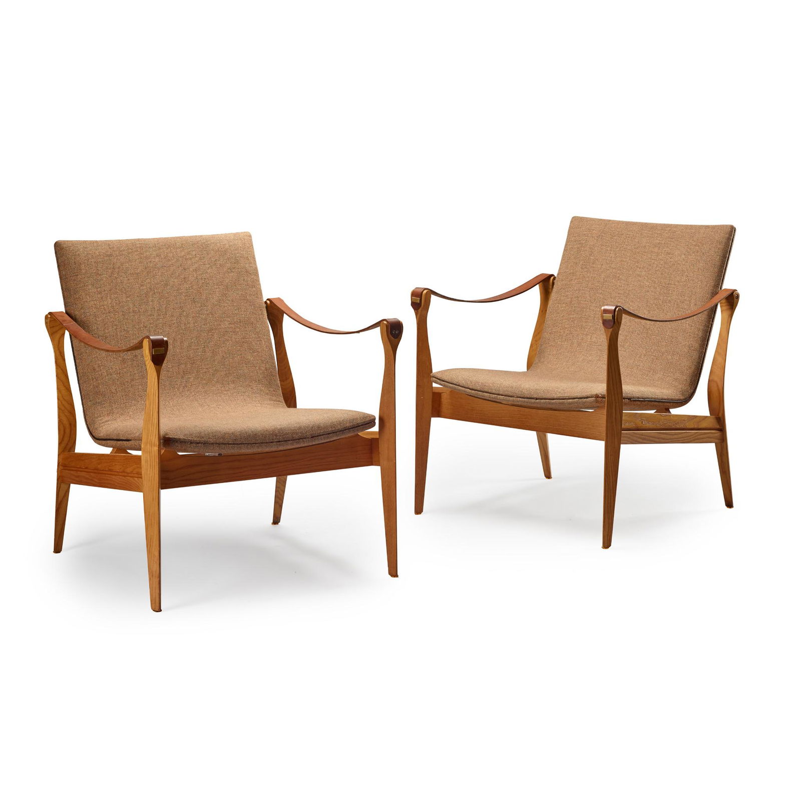 Karen & Ebbe Clemmensen (Danish, 1917-2001 & 1917-2003) for Fritz Hansen Two Safari Armchairs,: Karen & Ebbe Clemmensen (Danish, 1917-2001 & 1917-2003) for Fritz Hansen Two Safari Armchairs, model 4305, ash with original wool upholstery, leather star arms, with brass fittings, applied foil label