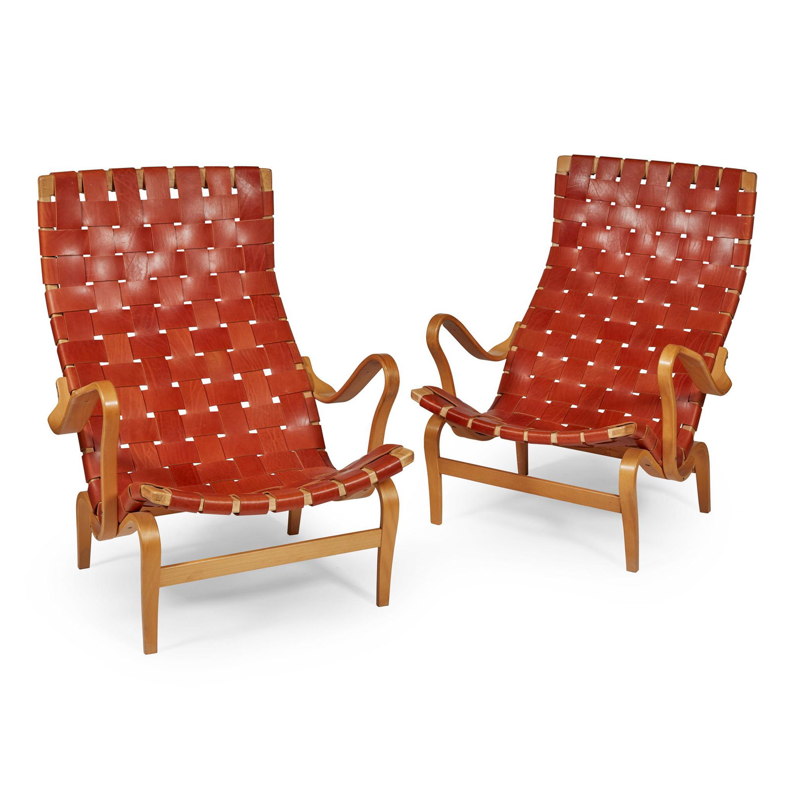 Bruno Mathsson (Swedish 1907-1988) for DUX Pair of 'Miranda' Armchairs: Bruno Mathsson (Swedish 1907-1988) for DUX Pair of 'Miranda' Armchairs Beech ply with leather woven upholstery, one stamped 'BRUNO MATTHESON FOR DUX'(98.5cm high, 76cm wide, 89cm deep (38.8in high, 29