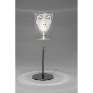 Fornasetti and Nigel Coates 'Lei' Table Lamp: Fornasetti and Nigel Coates 'Lei' Table Lamp 2/300, engraved 'COATES / FORNASETTI 2/300', transparent glass shade etched with Fornasetti's female muse, on metal 'touchtronic' lamp base(68.5cm high, 23