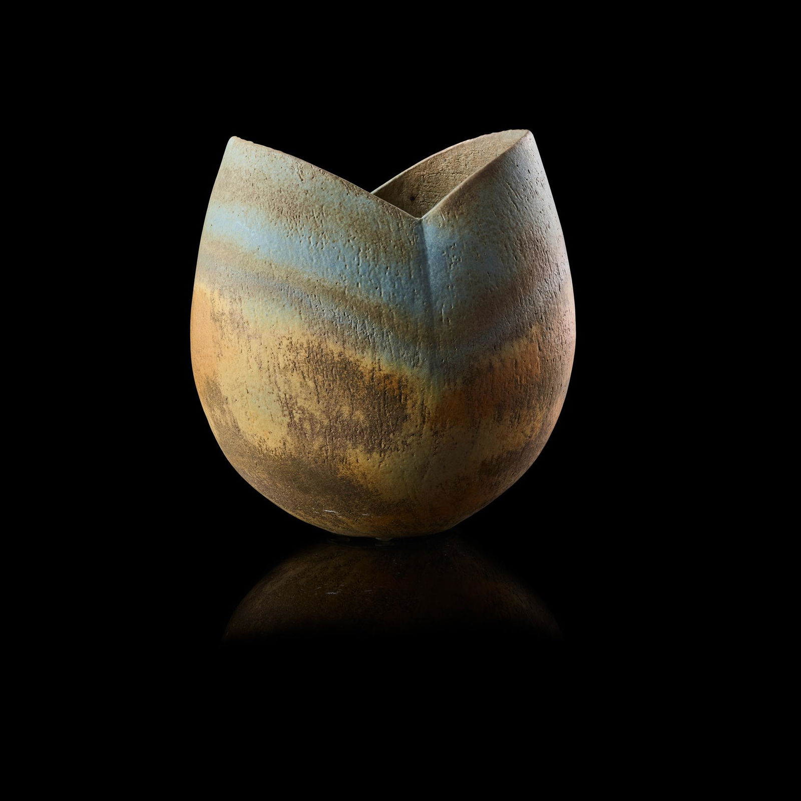 § John Ward (British 1938-) Vessel: § John Ward (British 1938-) Vessel impressed artist's seal, stoneware with green and umber glazes(21cm high, 19cm wide (8.25in high, 7.5in wide))