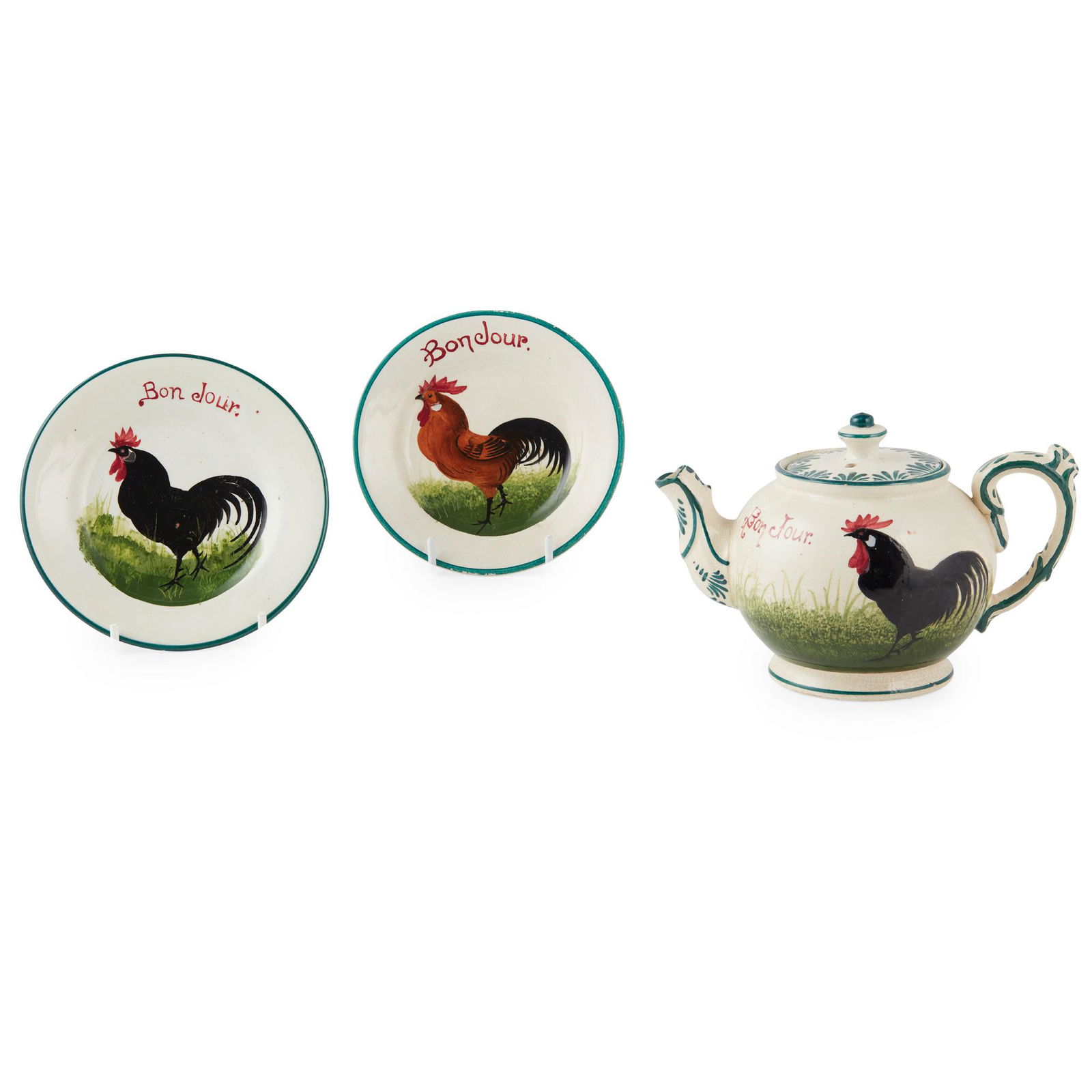 A WEMMYSS WARE COMB TRAY 'BLACK COCKEREL & HENS' PATTERN, CIRCA 1900: A WEMMYSS WARE COMB TRAY 'BLACK COCKEREL & HENS' PATTERN, CIRCA 1900 impressed WEMYSS WARE/ R. H. & S., printed retailer's stamp T. GOODE & CO., 25.5cm across; together with a group of 'BROWN COCKEREL