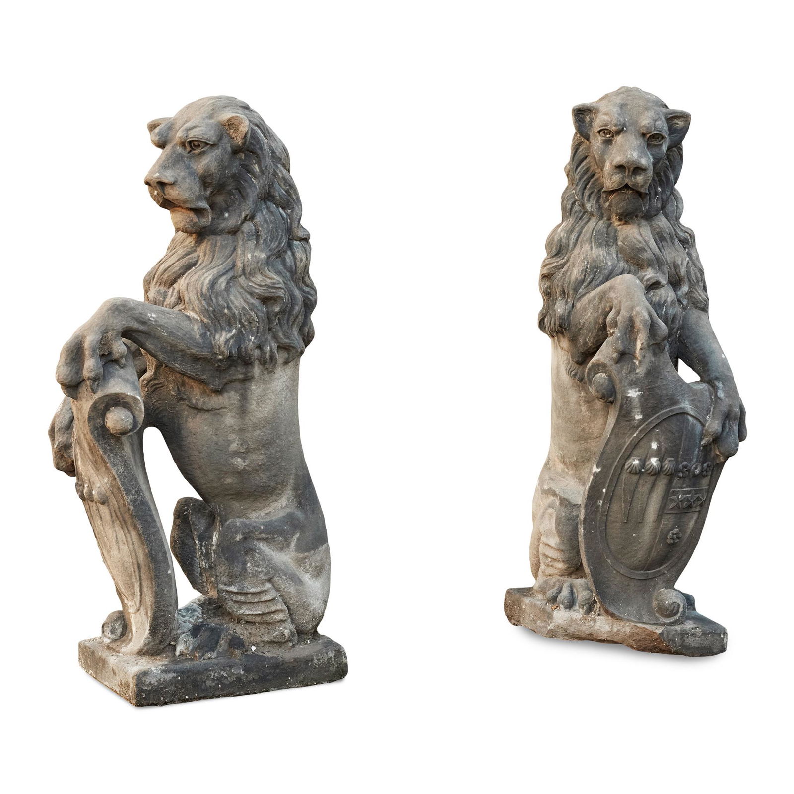 PAIR OF SCOTTISH CARVED STONE ARMORIAL LION GATE FINIALS 19TH CENTURY: modelled as an opposing pair of seated lions supporting a coat of arms on square plinth bases(each 100cm high)Qty: (2)Note: The coat of arms is a Marital Arms of Graeme and Primrose. These arms allude