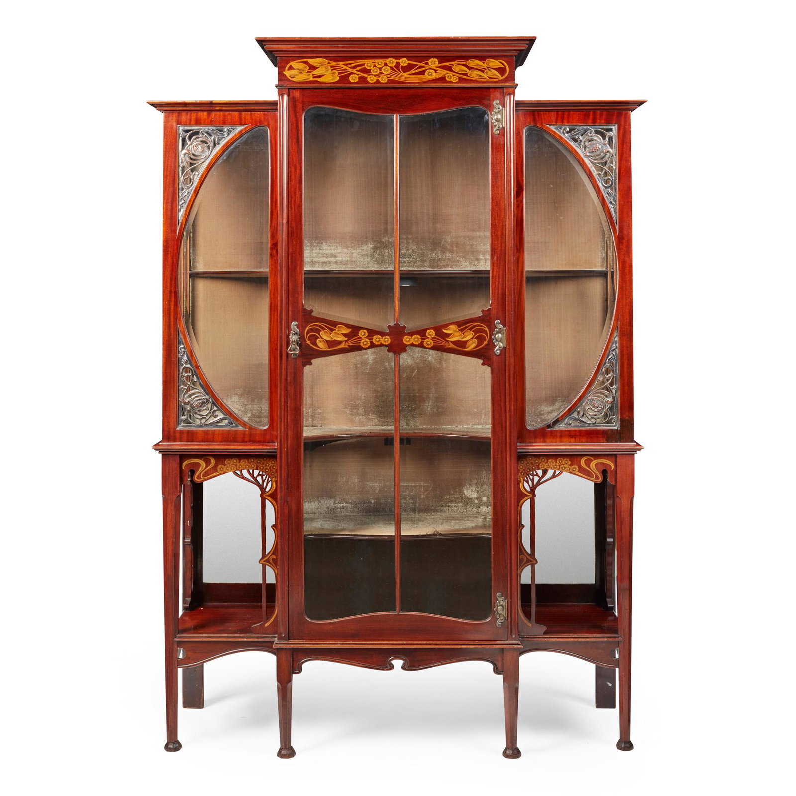 CHRISTOPHER PRATT AND SONS, BRADFORD (ATTRIBUTED TO) DISPLAY CABINET, CIRCA 1910: mahogany, marquetry inlay and decorated with penwork, applied silvered metal, bevelled glass, with plush lining and key(128cm (50 1/4in) wide, 194cm (76 1/4in) high, 44cm (17 1/4in) deep)