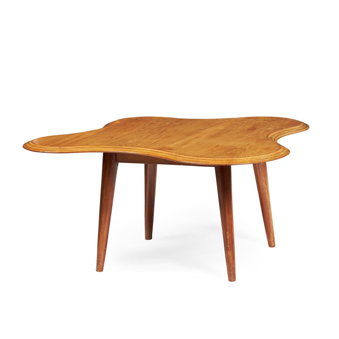 NEIL MORRIS FOR H. MORRIS & CO. LTD., GLASGOW ‘CLOUD TABLE’, CIRCA 1947: NEIL MORRIS FOR H. MORRIS & CO. LTD., GLASGOW â€˜CLOUD TABLEâ€™, CIRCA 1947 mahogany plywood, Betula wood, applied makers plaque and retailer's paper label (103cm wide, 48cm high)