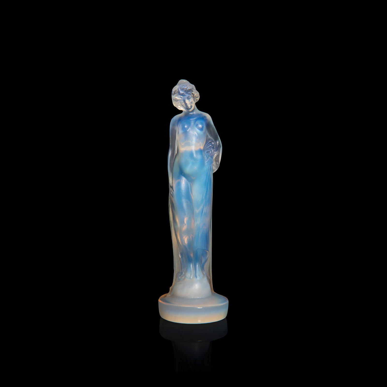 ‡ René Lalique (French 1860-1945) MOYENNE NUE STATUETTE, NO. 830: ‡ René Lalique (French 1860-1945) MOYENNE NUE STATUETTE, NO. 830 designed 1912 opalescent engraved R. Lalique France (14.5cm (5 5/8in) high)