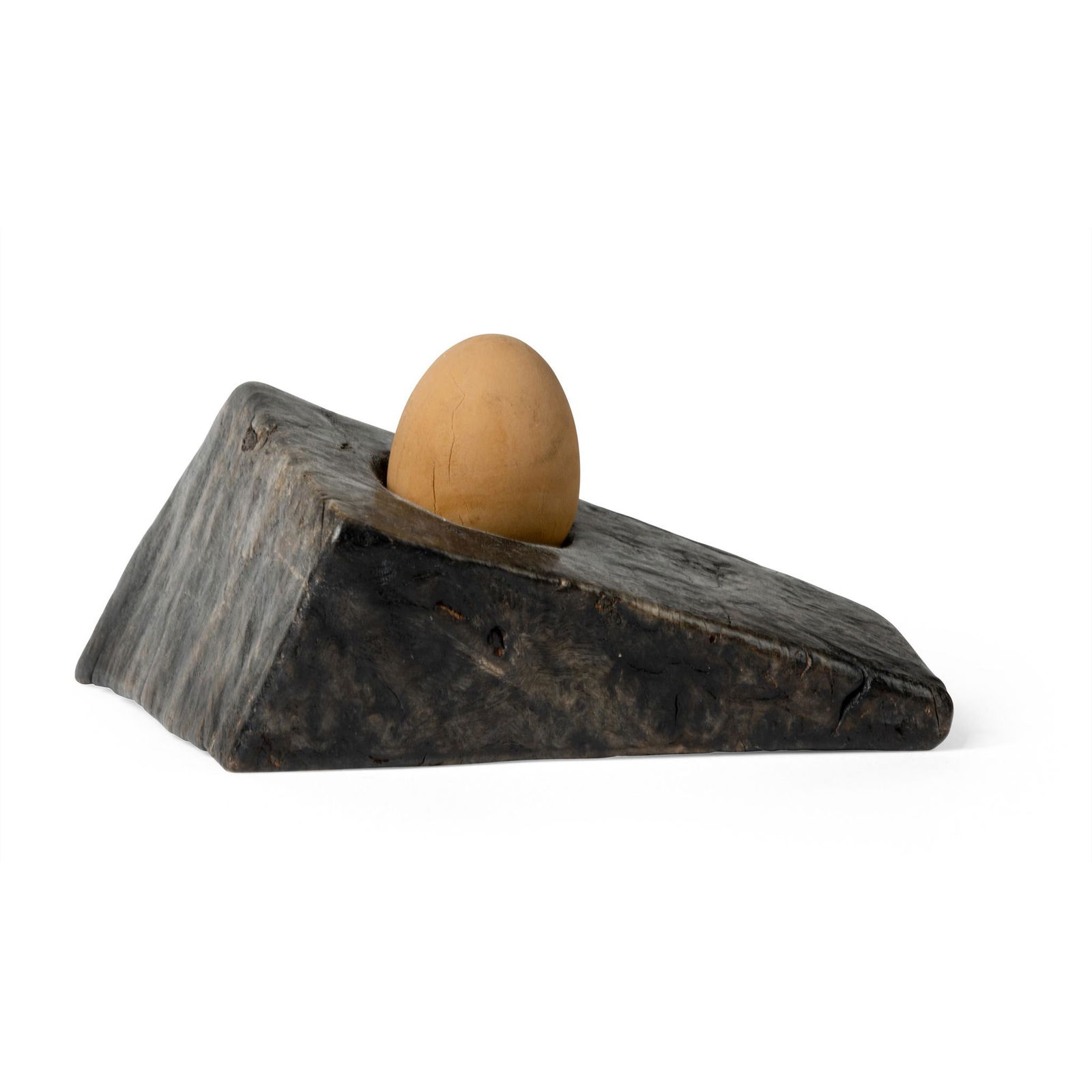 § Jim Partridge (British 1953-) Egg Cup, circa 1984: § Jim Partridge (British 1953-) Egg Cup, circa 1984 scorched oak (8cm high, 16.5cm long, 13cm deep (3 1/8in high, 6 1/2in long, 5 1/8in deep)) Provenance The Collection of Ann Sutton O.B.E.