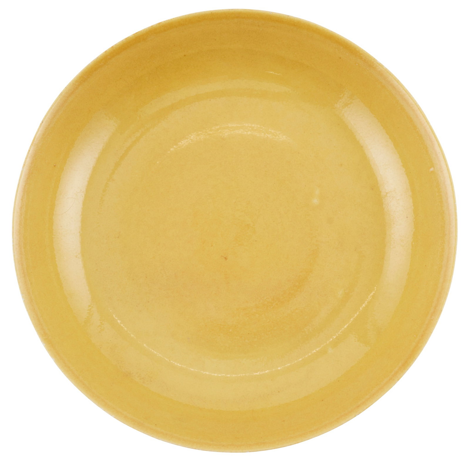 YELLOW-GLAZED PLATE HONGZHI MARK, MING DYNASTY OR LATER: 明或以後 弘治款 黃釉盤 with gently flared rim, the yellow glaze covered inside out, the base inscribed with a six-character Hongzhi mark in 