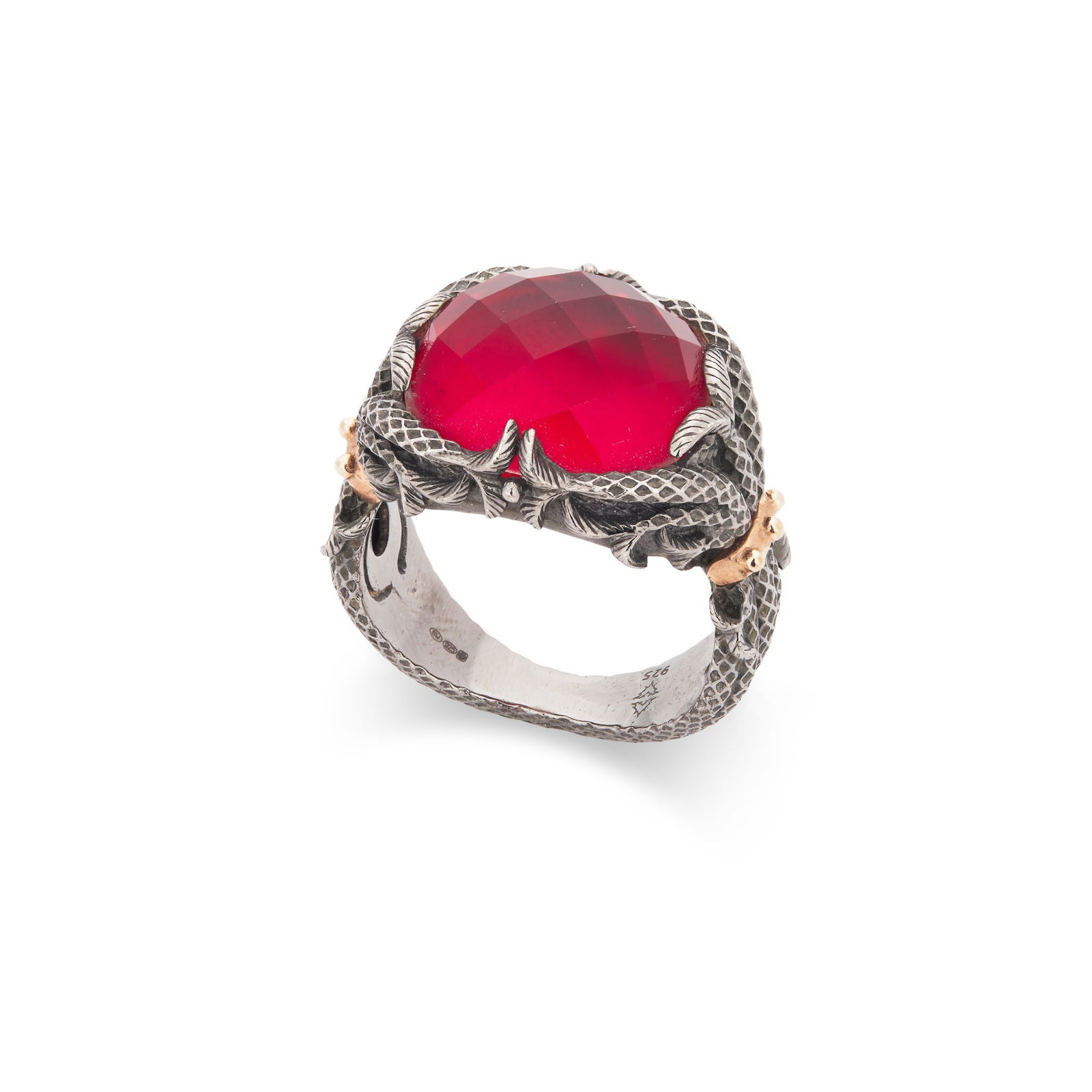 Stephen Webster: A synthetic ruby ring: Stephen Webster: A synthetic ruby ring Claw-set with a mixed-cut synthetic ruby, stylised mount, modelled in oxidized silver (Ring size: P)