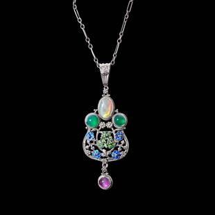 ATTRIBUTED TO JOHN PAUL COOPER (1869-1933) FOR THE ARTIFICERS’ GUILD ARTS & CRAFTS PENDANT, CI: ATTRIBUTED TO JOHN PAUL COOPER (1869-1933) FOR THE ARTIFICERS’ GUILD ARTS & CRAFTS PENDANT, CIRCA 1908 enamelled white metal, set opal, amethyst and chrysoprase cabochons, within original silk a