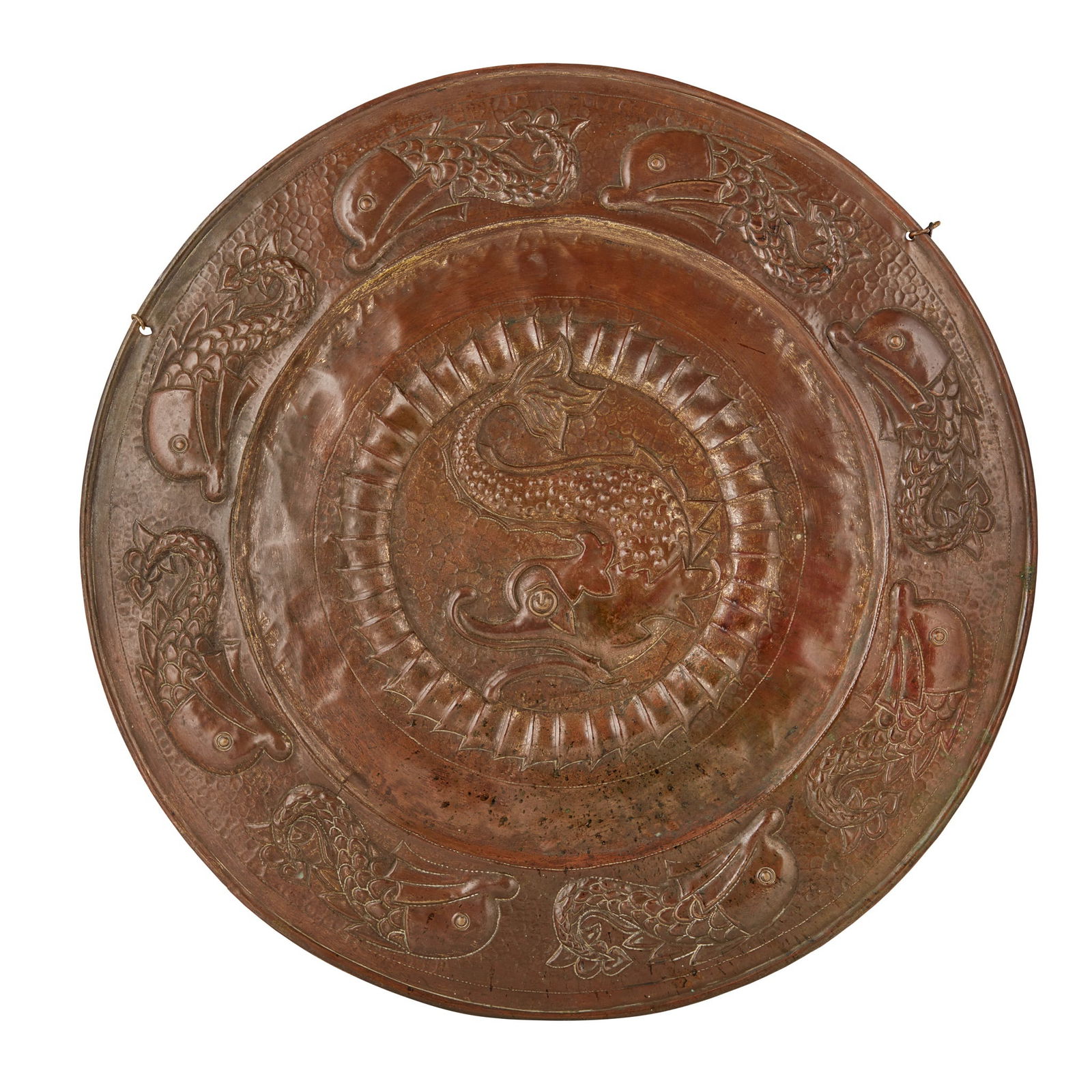 MANNER OF JOHN PEARSON ARTS & CRAFTS CHARGER, CIRCA 1900: MANNER OF JOHN PEARSON ARTS & CRAFTS CHARGER, CIRCA 1900 repoussÃ©-decorated copper (59cm diameter)
