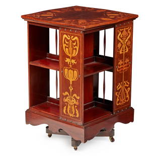 SHAPLAND & PETTER, BARNSTAPLE REVOLVING BOOKCASE, CIRCA 1900: SHAPLAND & PETTER, BARNSTAPLE REVOLVING BOOKCASE, CIRCA 1900 mahogany and plum-pudding mahogany with marquetry inlay, stamped 131 (55cm across, 83cm high) Literature: Bennett D. Shapland & Petter of B