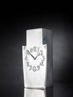 ARCHIBALD KNOX (1864-1933) FOR LIBERTY & CO., LONDON RARE CRUCIFORM 'TUDRIC' CLOCK, CIRCA 1902: ARCHIBALD KNOX (1864-1933) FOR LIBERTY & CO., LONDON RARE CRUCIFORM 'TUDRIC' CLOCK, CIRCA 1902 model 098, pewter, inlaid with abalone shell, stamped TUDRIC 098 (37.5cm high) Literature: Martin, S., Ar