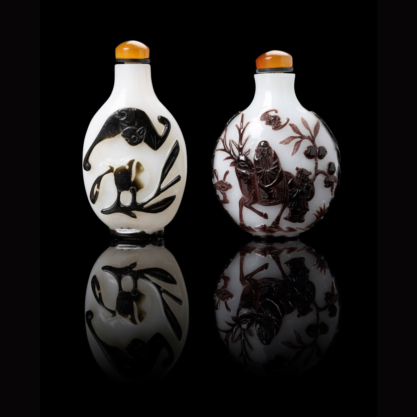 TWO PURPLE AND BLACK-OVERLAY GLASS SNUFF BOTTLES QING DYNASTY, 19TH CENTURY (1 of 3)