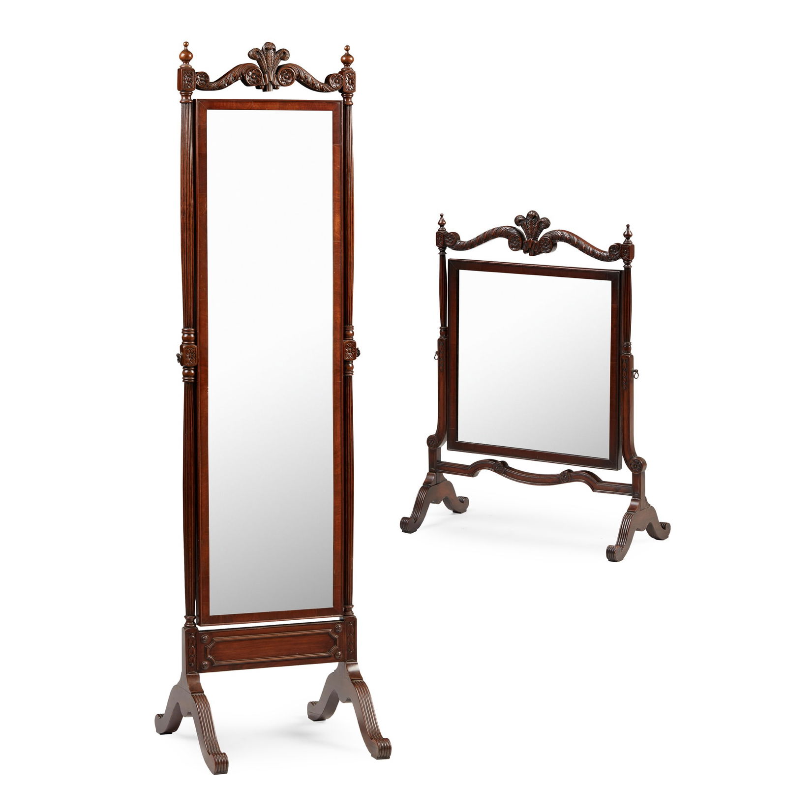CARVED MAHOGANY CHEVAL AND DRESSING TABLE MIRRORS EARLY 20TH CENTURY: CARVED MAHOGANY CHEVAL AND DRESSING TABLE MIRRORS EARLY 20TH CENTURY the arched crest rails with acanthus scrolls centred by Prince-of-Wales feathers and flanked by turned finials, the fluted uprights