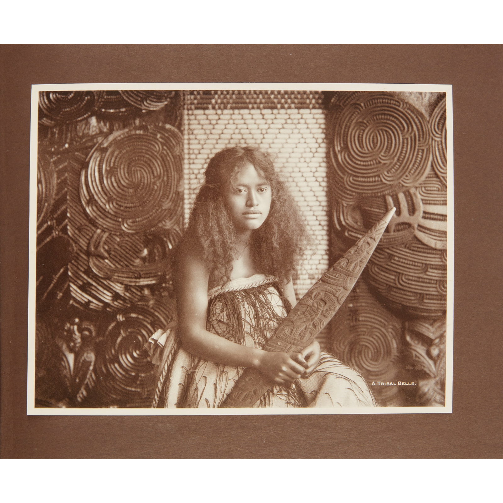 New Zealand Maori Studies: Maori Studies Permanent Carbonette Photos. Wellington: Thos. Pringle, c.1900. Oblong 4to, original card wrappers with mounted carbon-print photograph to front cover, 12 carbon-print photographs (18.5 