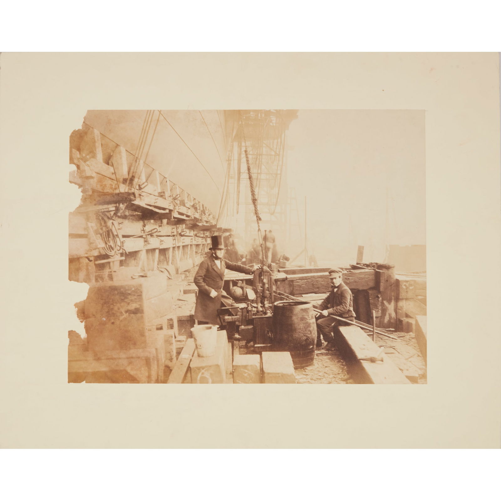 Robert Howlett (1831-1858) Three photographs of the Great Eastern, 1857: Three photographs of the Great Eastern, 1857 albumen prints, mounted, comprising:Starboard elevation from mid-Thames, 17 November 1857, 21.5 x 33cm, mount aperture 20.8 x 26.8, extensive loss to left