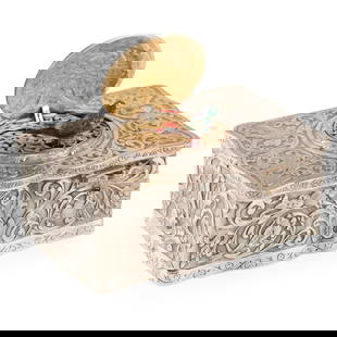 GERMAN OR AUSTRIAN SILVER AND GILT-SILVER SINGING BIRD BOX: GERMAN OR AUSTRIAN SILVER AND GILT-SILVER SINGING BIRD BOX CIRCA 1880, PROBABLY HANAU of serpentine rectangular form, engraved with birds between cornucopia and scrolling vines, with an oval spring
