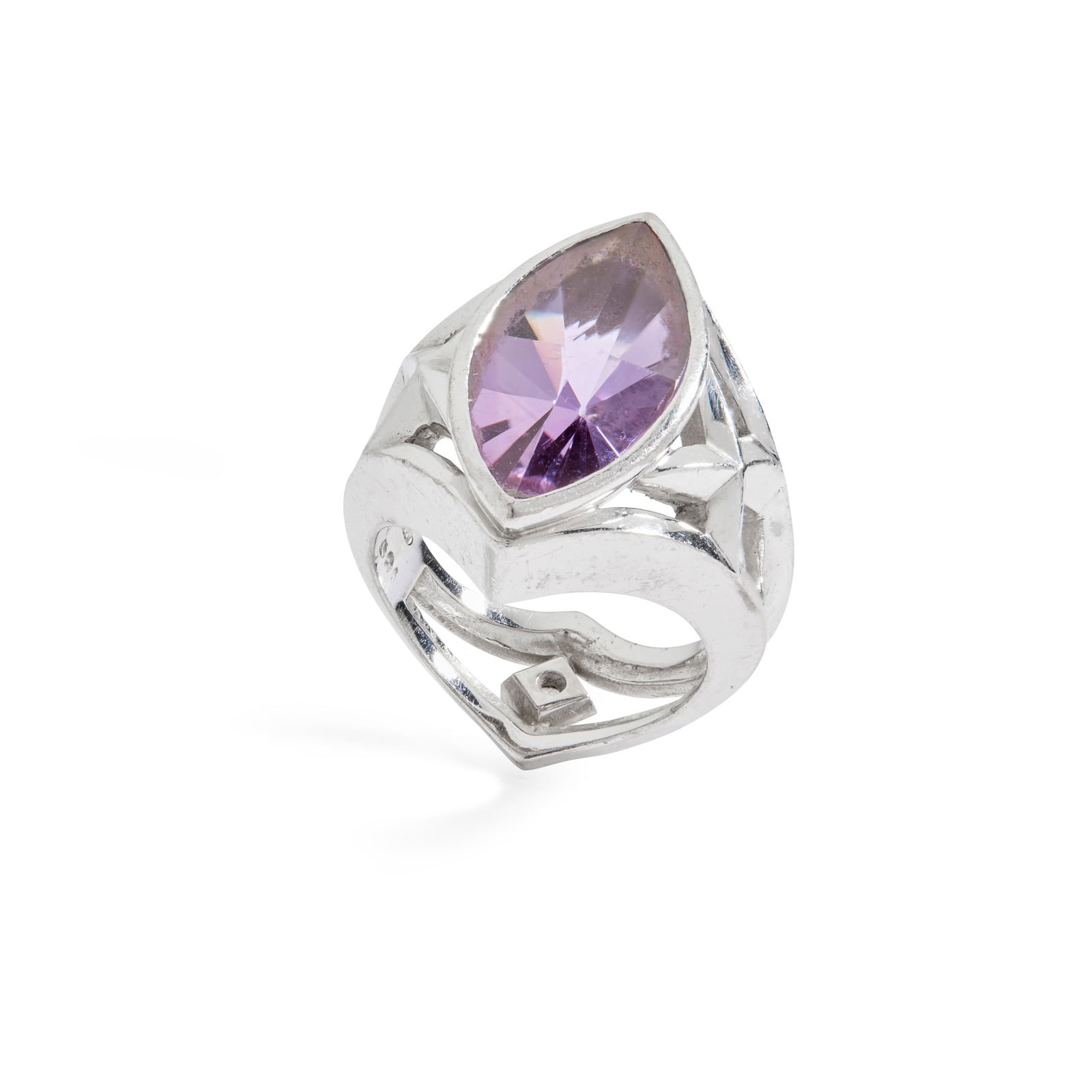 Stephen Webster: An amethyst and diamond ring: Stephen Webster: An amethyst and diamond ring Collet-set with a marquise mixed-cut amethyst, pierced detail to shoulders, set with a round brilliant-cut diamond to reverse of the band, stamped 18ct Ri