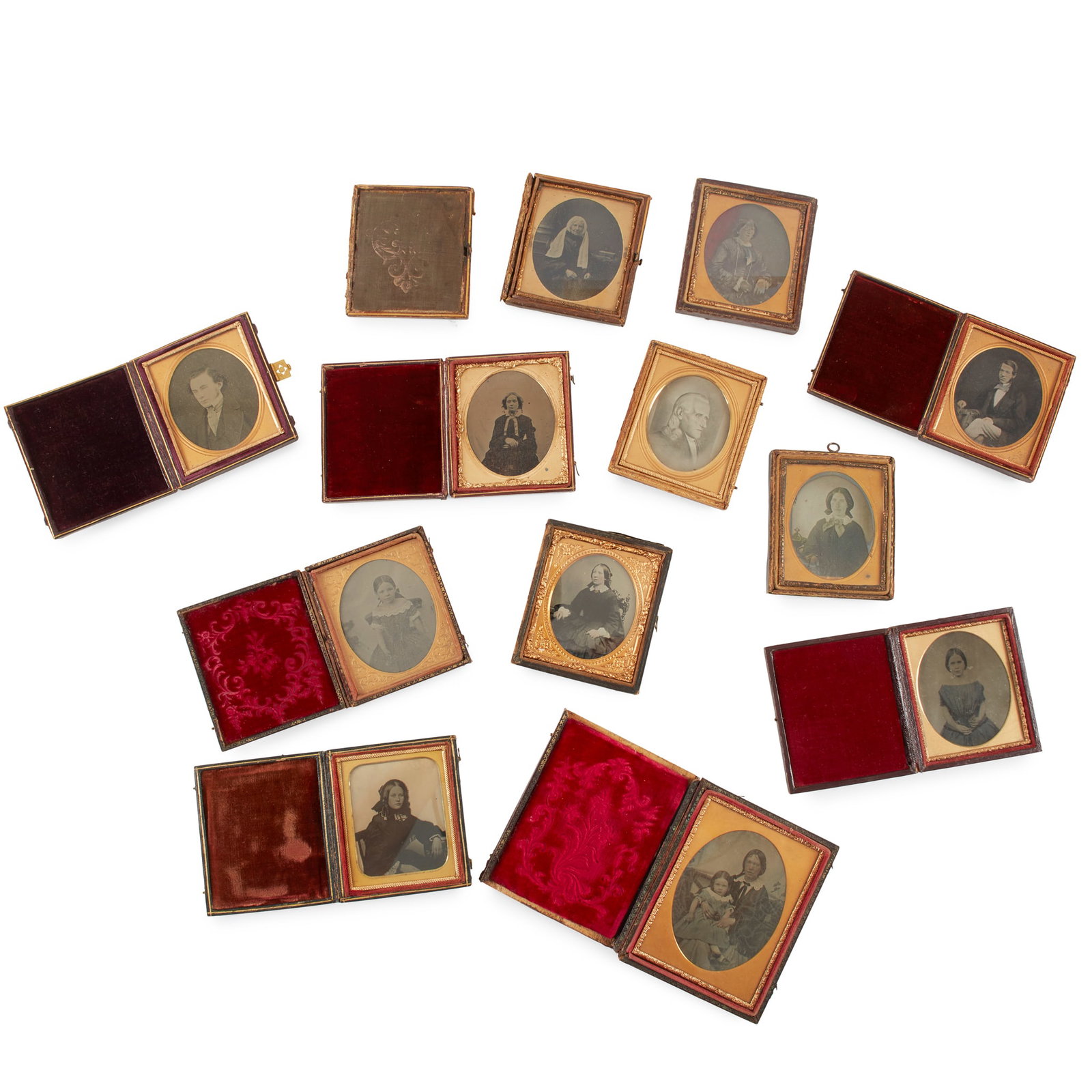 25 Cased Ambrotypes: 25 Cased Ambrotypes Mainly studio portraits Group of cased ambrotypes in 3 sizes: 7 are 1/4 plate (approximately 11 x 8cm), 15 are 1/6 plate (approximately 8 x 7cm) and 3 are 1/9 plate (approximately 