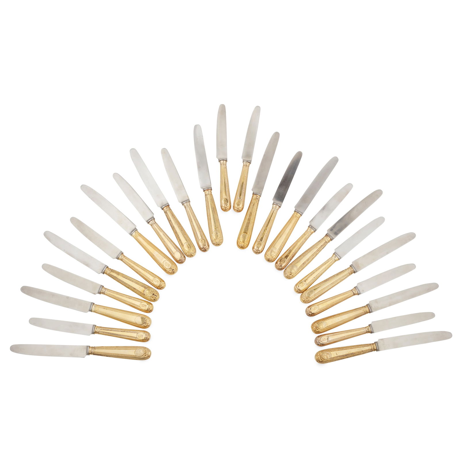 A RARE SUITE OF TWENTY-FOUR GEORGE III SCOTTISH SILVER GILT TABLE AND DESSERT KNIVES: A RARE SUITE OF TWENTY-FOUR GEORGE III SCOTTISH SILVER GILT TABLE AND DESSERT KNIVES DAVID MARSHALL, EDINBURGH CIRCA 1785 - 1795 (DATE LETTER LACKING) comprising twelve table knives and twelve dessert